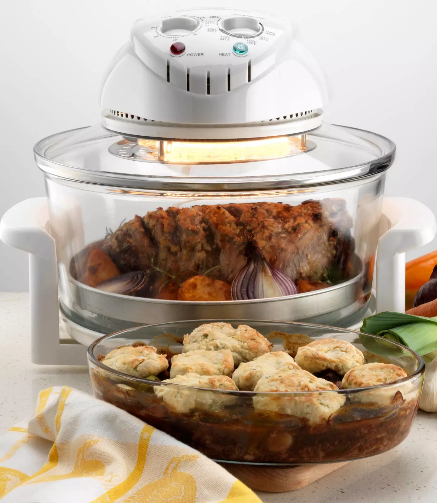 A halogen oven cooking a roast lamb. (Getty Stock Photo)
