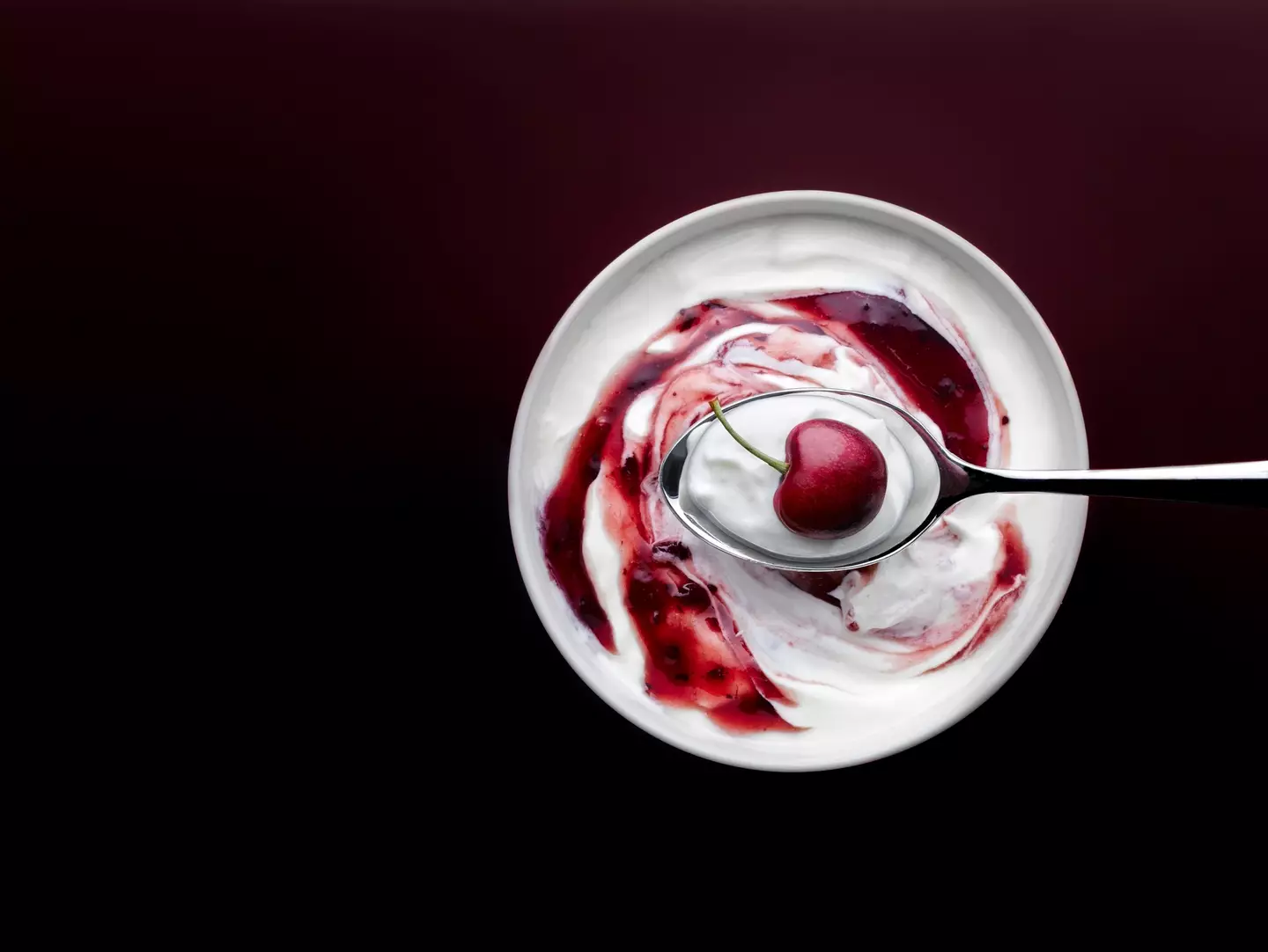 A whip of yoghurt and cherry coulis - Ben Monk via Getty Images