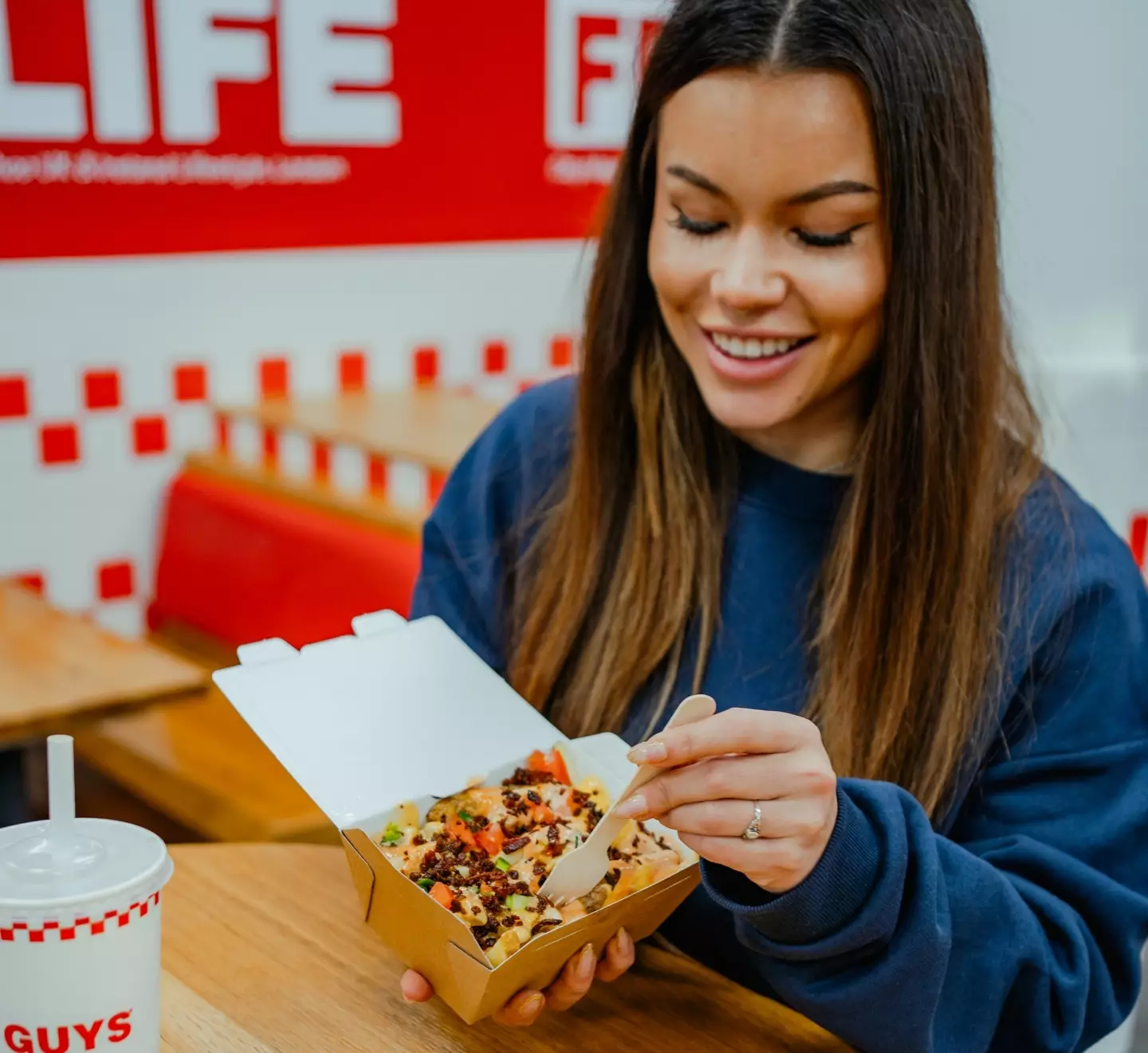 Early reactions call the customisable Loaded Fries an instant hit nationwide (Five Guys)