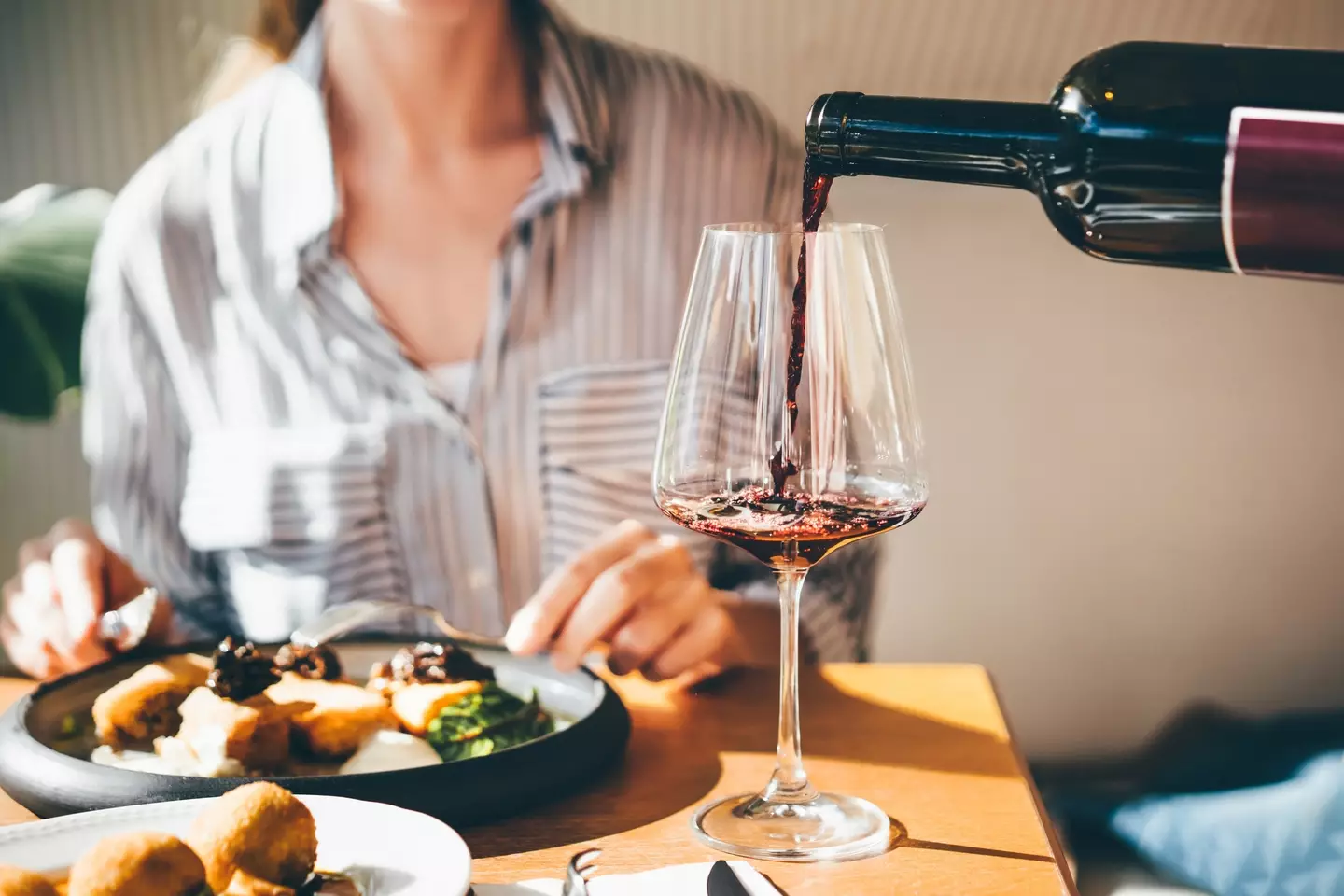 You'll need the wine to wash down this dry-looking roast dinner (Maria Korneeva/Getty Images)