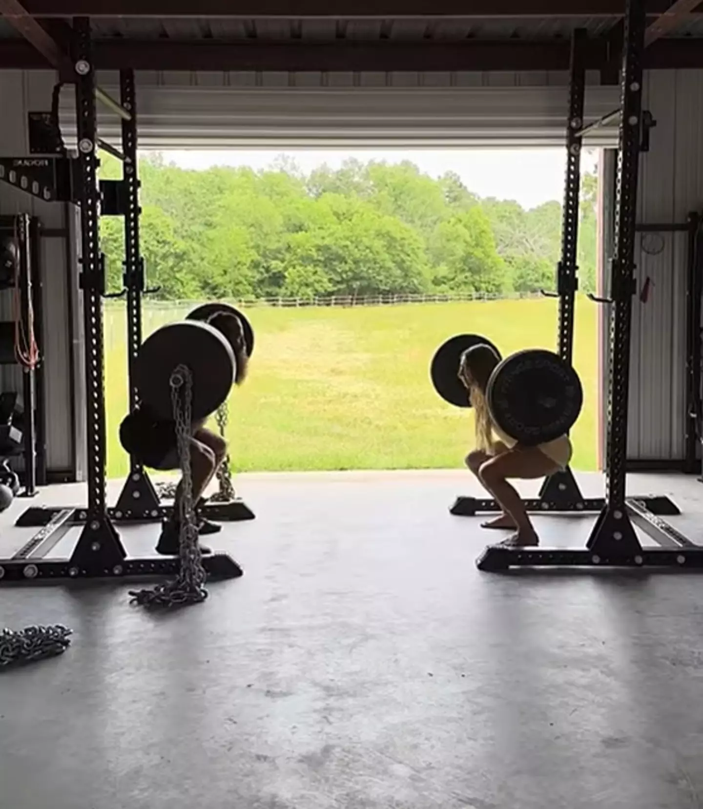 Johnson working out at home with wife Barbara (Liver King/YouTube)