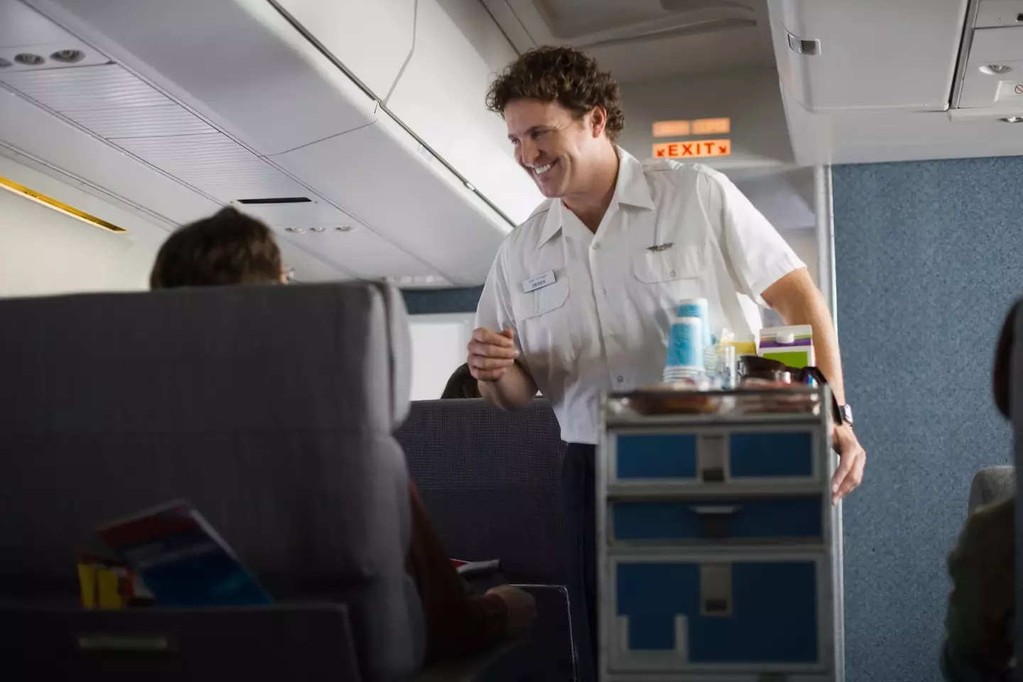 Always ask a cabin crew member to give your tray table a wipe before you start eating. (Jupterimages)