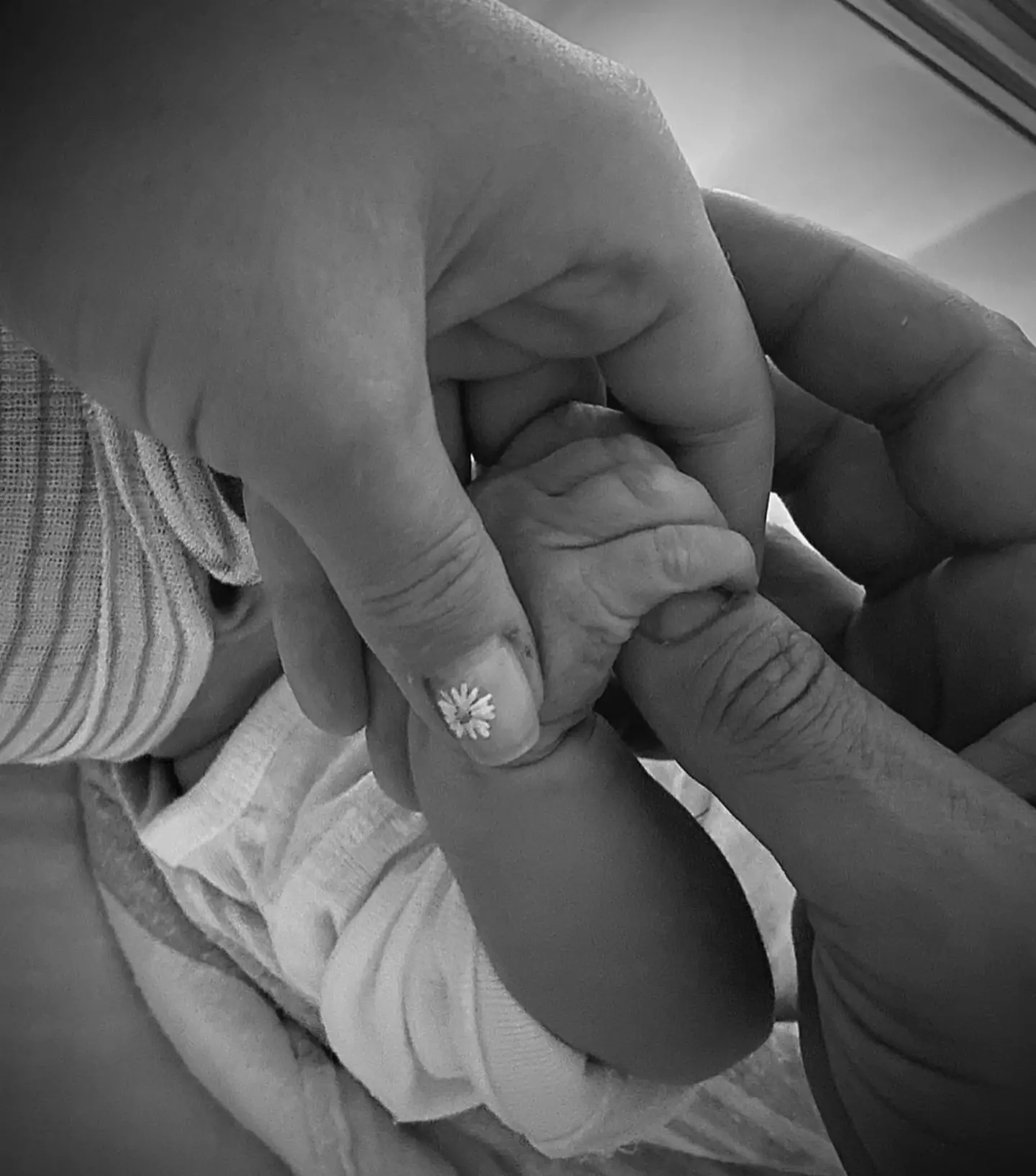 Katy Perry and Orlando Bloom with their newborn daughter.