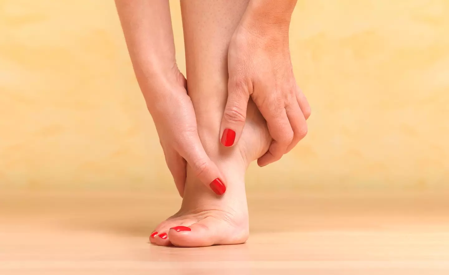 Swollen feet and ankles could also be a sign of liver damage (Peter Dazeley / Getty Images)
