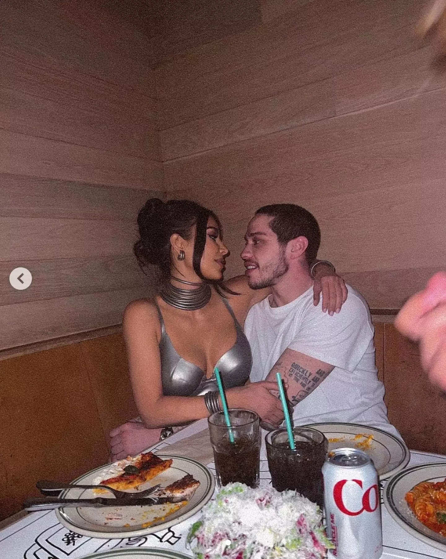 It appeared their ‘late night snack’ was a bit of a mismatch of pizza, fried chicken, coleslaw and a huge centrepiece salad - with some cola to wash it down (Instagram @kimkardashian).