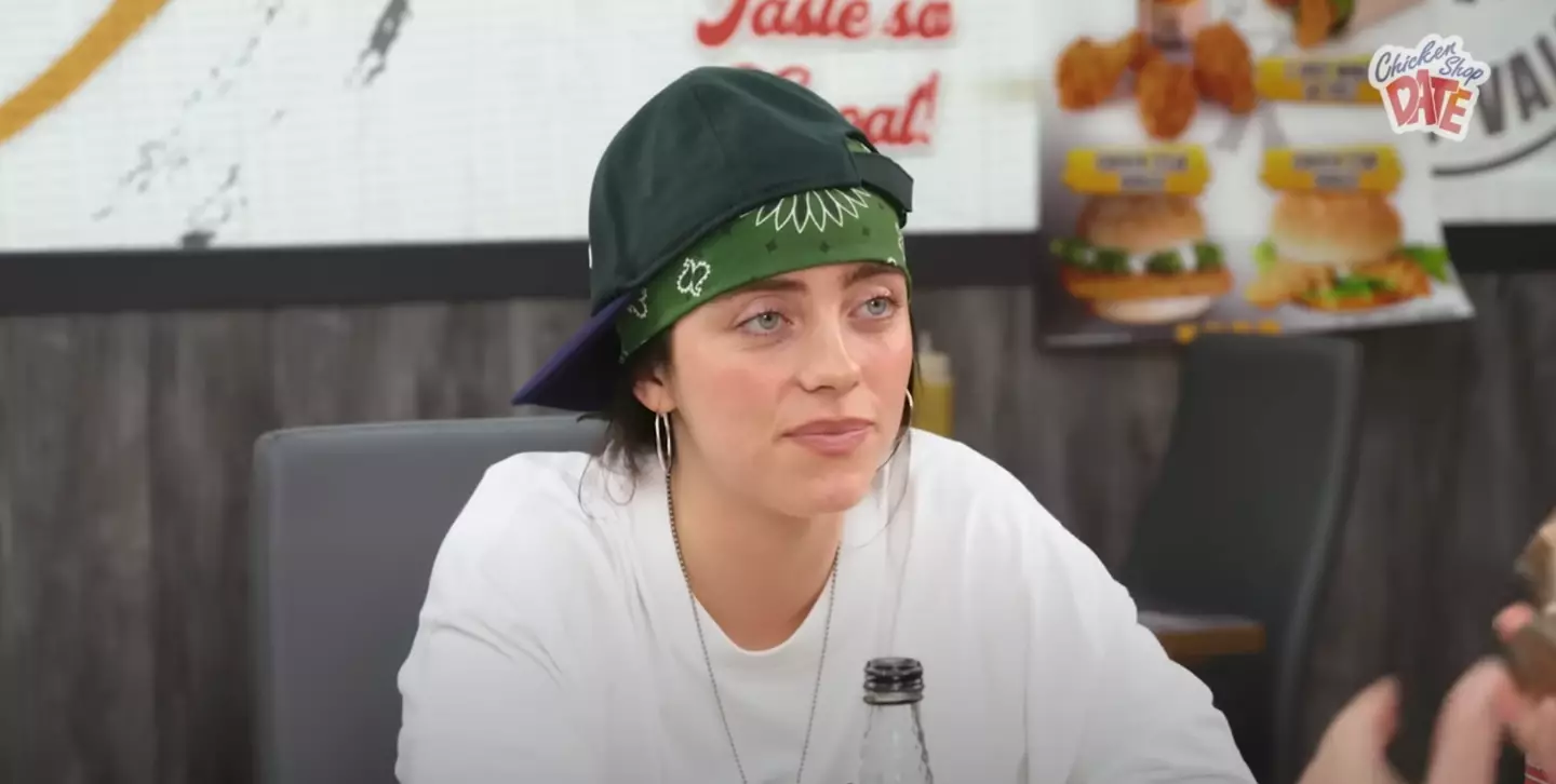 Billie Eilish appeared on the most recent instalment of Chicken Shop Date. (YouTube/Amelia Dimoldenberg)