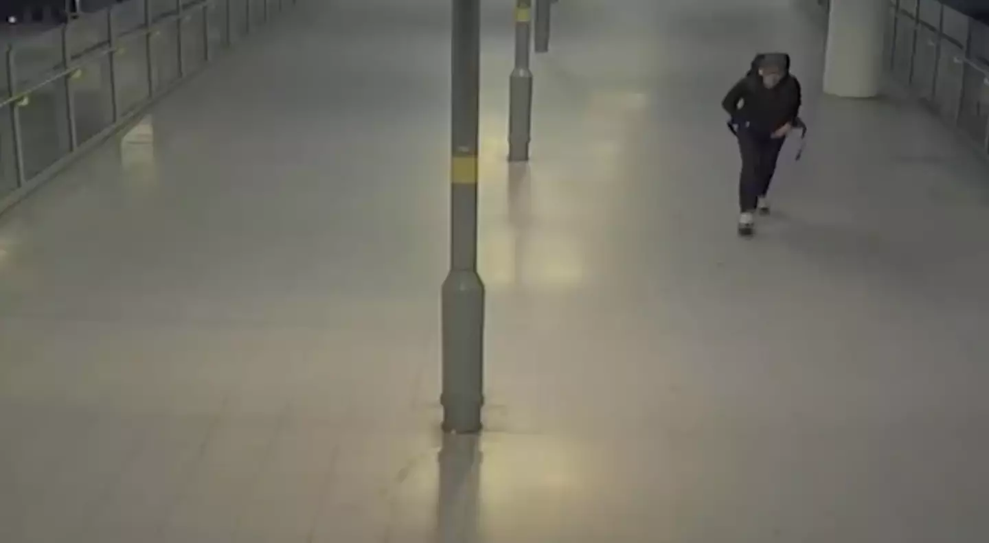 Abedi can be seen walking with the backpack (