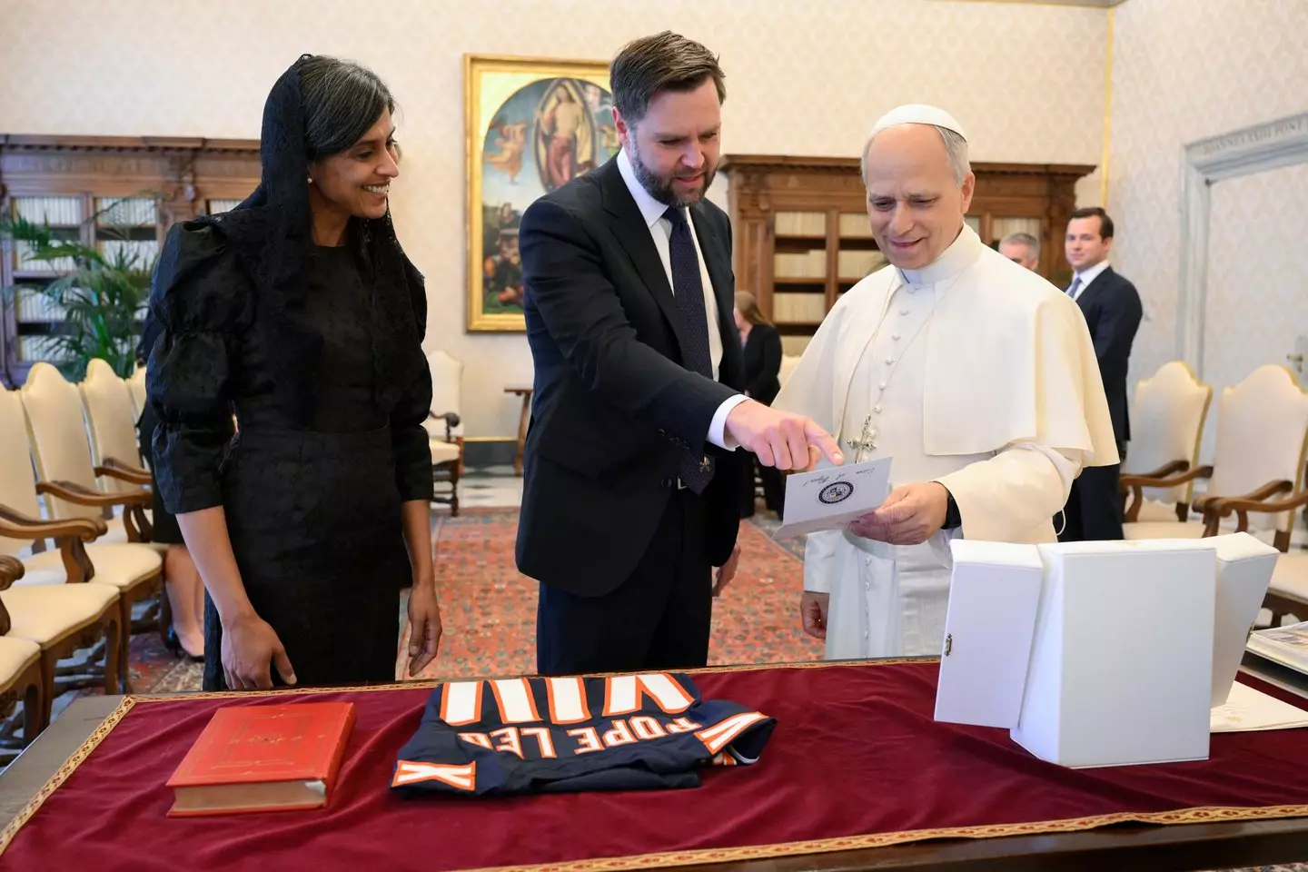 The pope received an NFL jersey (Simone Risoluti Vatican Media via Vatican Pool/Getty Images)