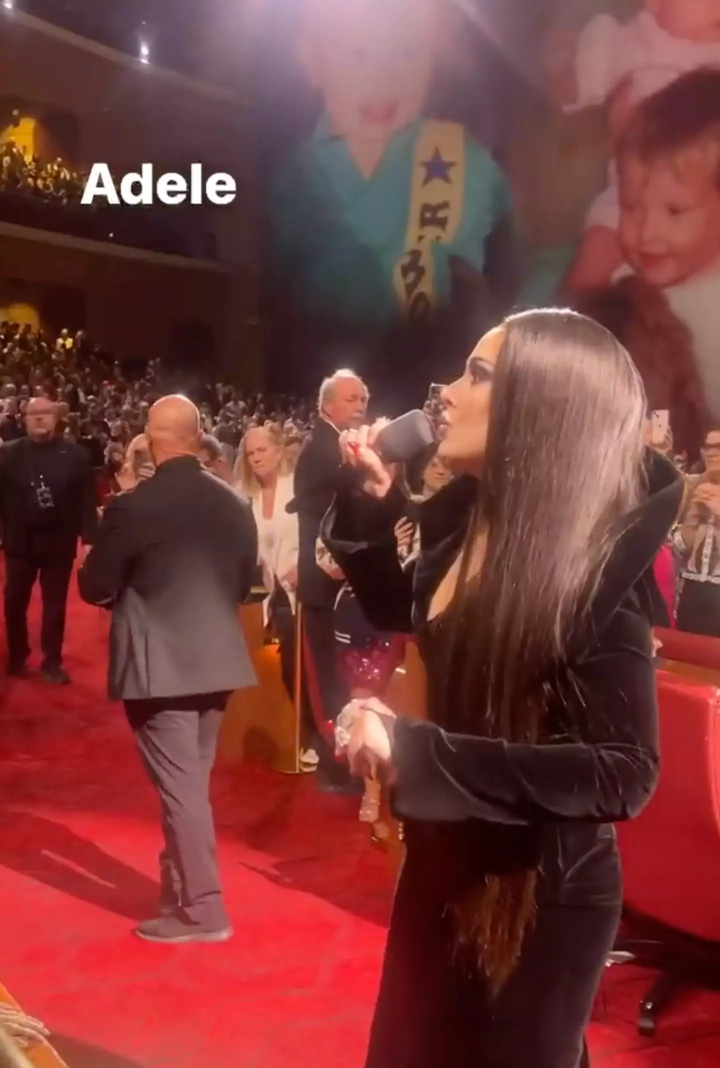 She spotted someone in the crowd she recognised.