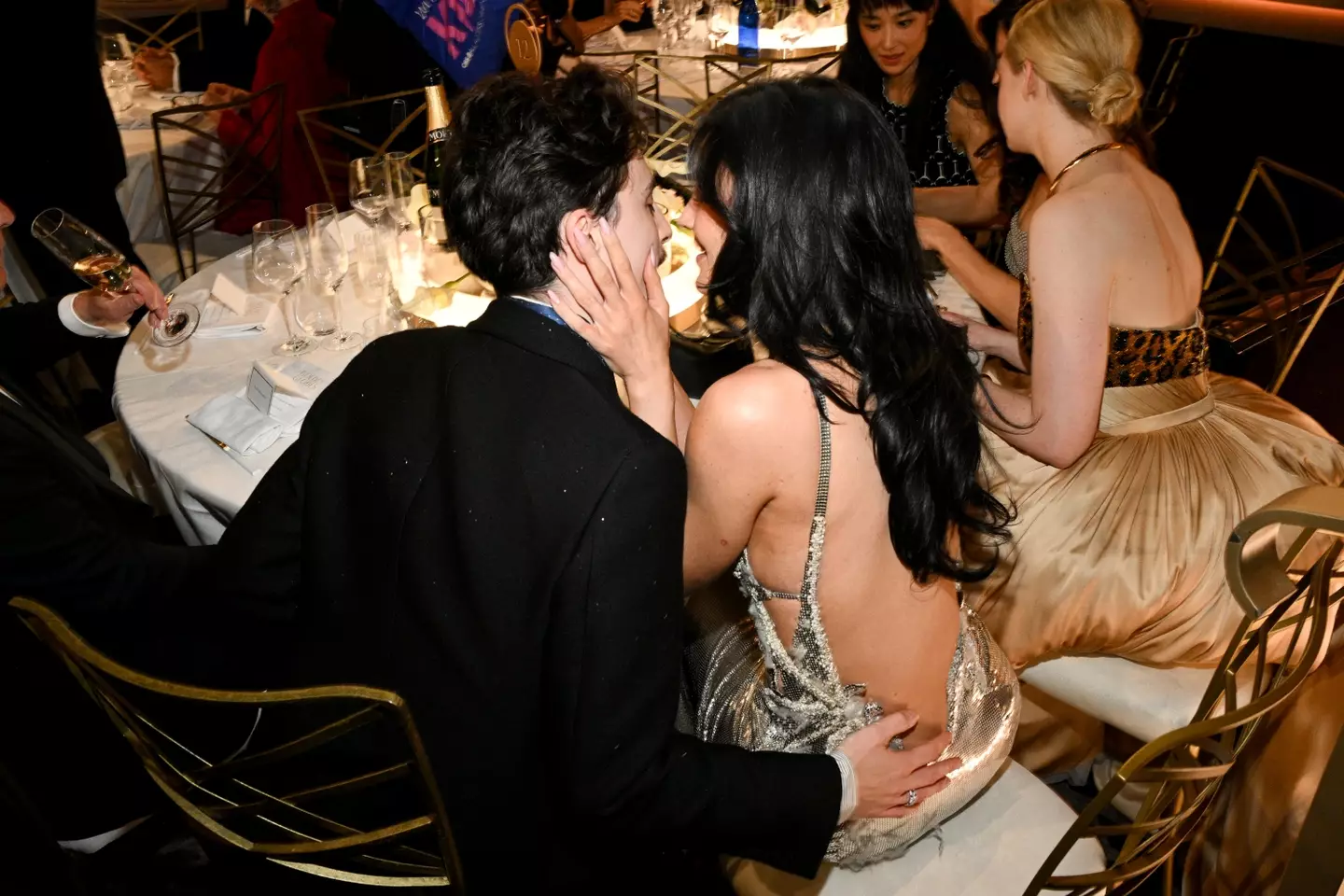 The couple were seen locking lips on Sunday night (Michael Buckner/GG2025/Penske Media via Getty Images)