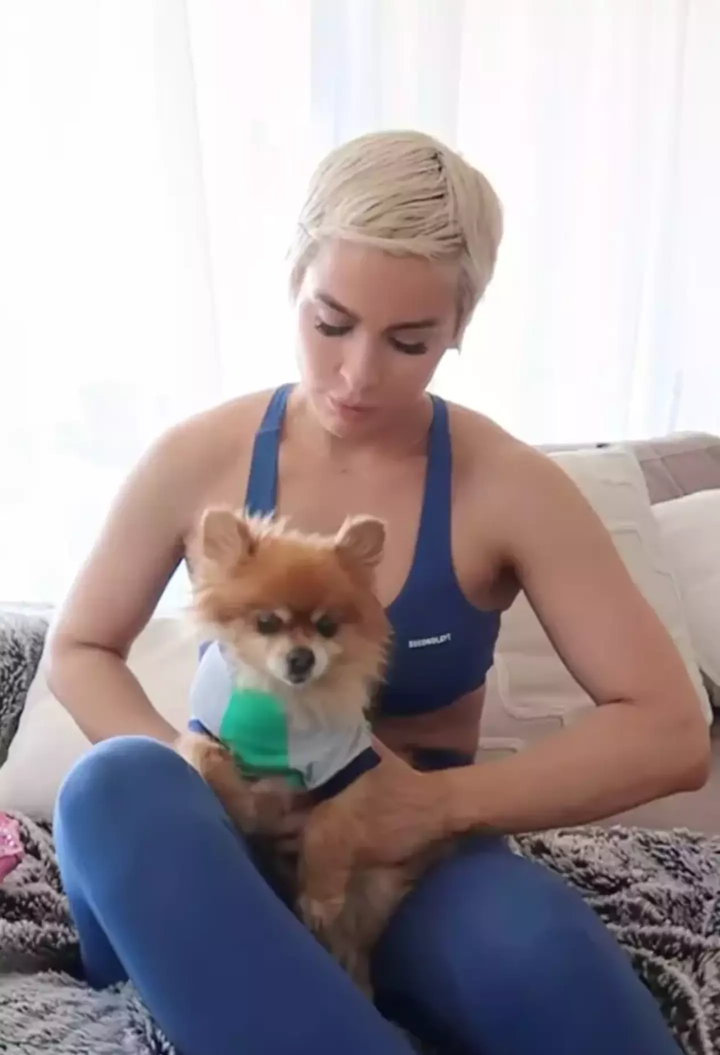 Ellie shared a video of her dressing her dog in comparison to a mum trying to calm down a restless toddler.