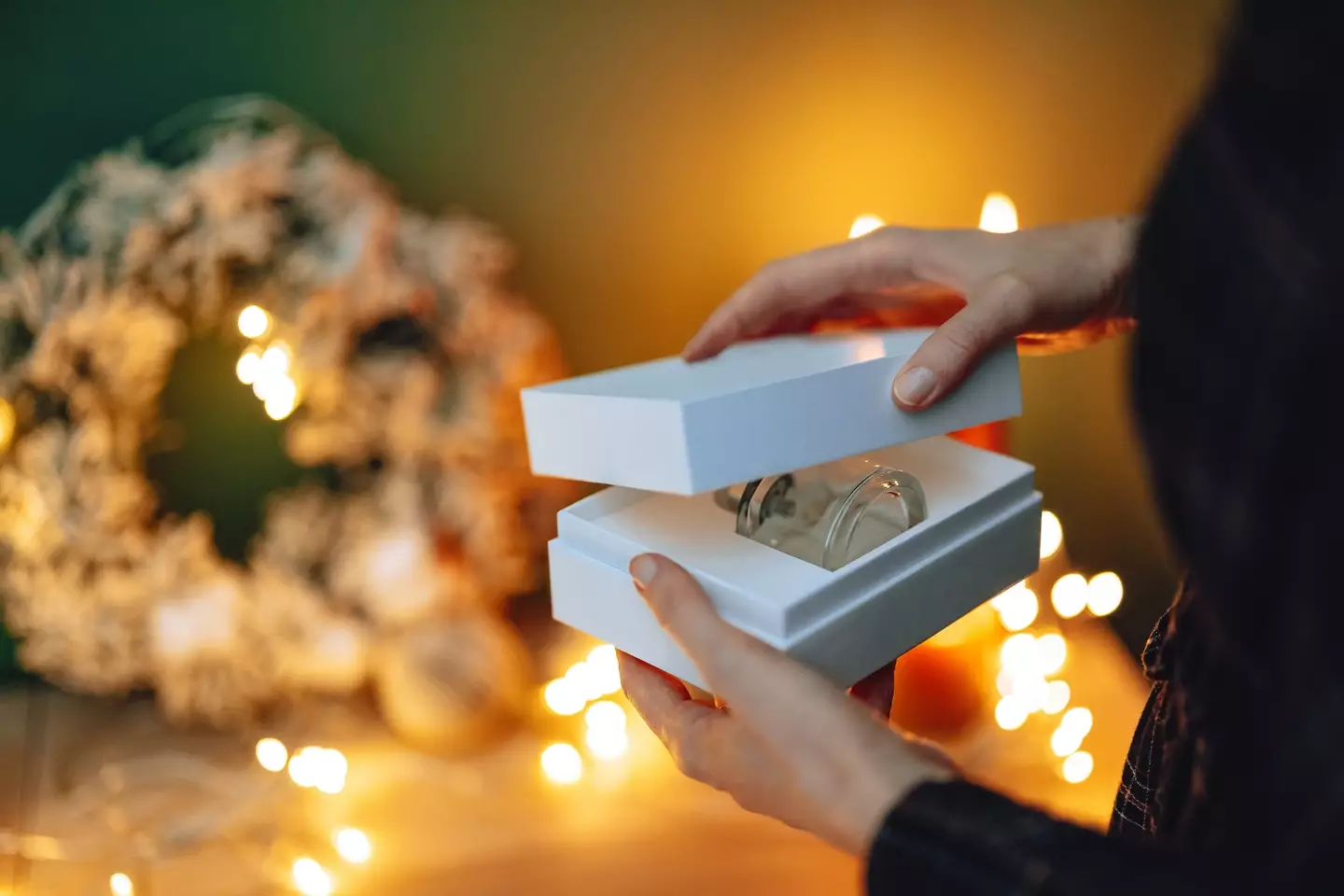 Deodorant and perfume are apparently major no-no's when it comes to Secret Santa (miniseries / Getty Images)