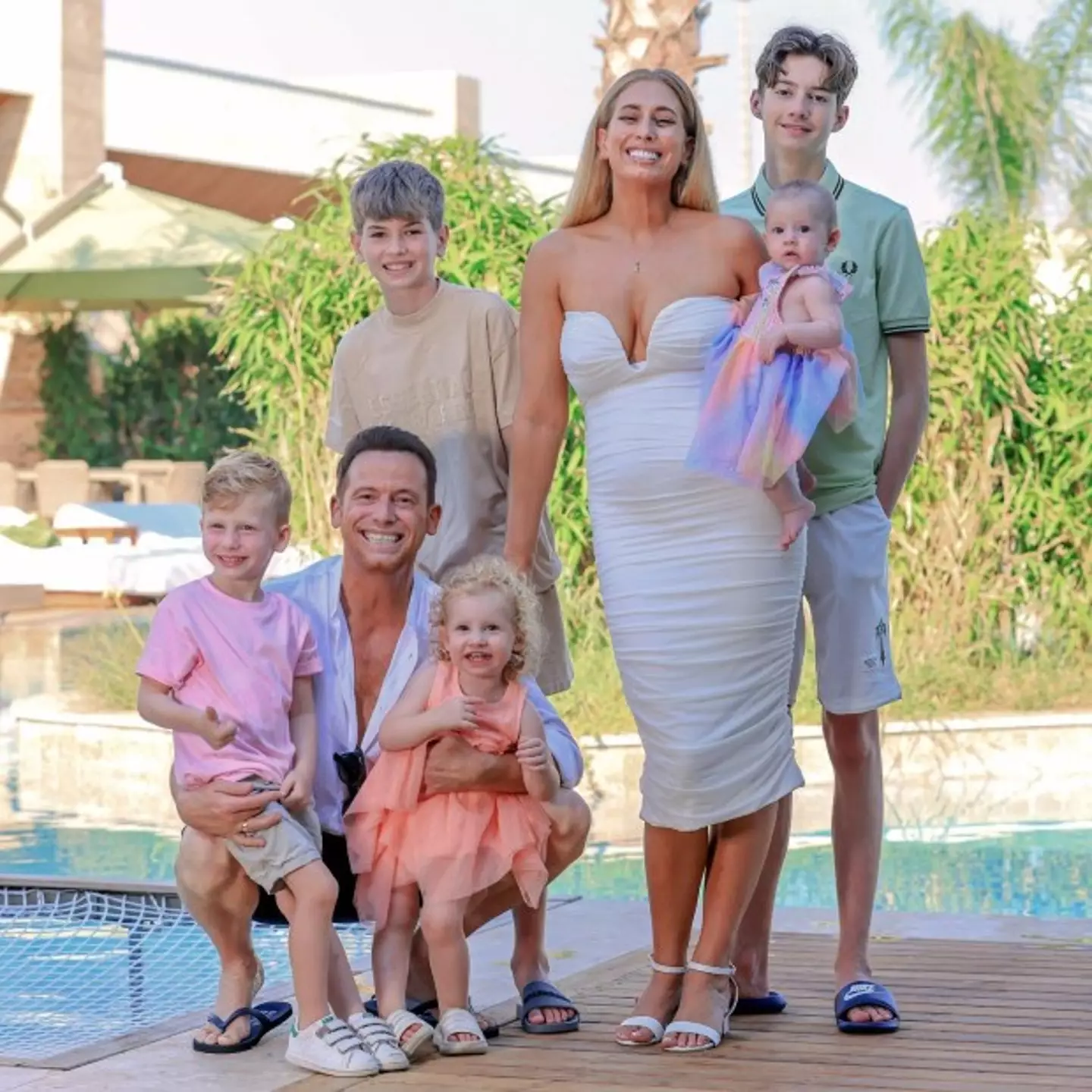 Taking to social media, the 33-year-old has shared holiday pics with her five kids, three of which she shares with Joe.