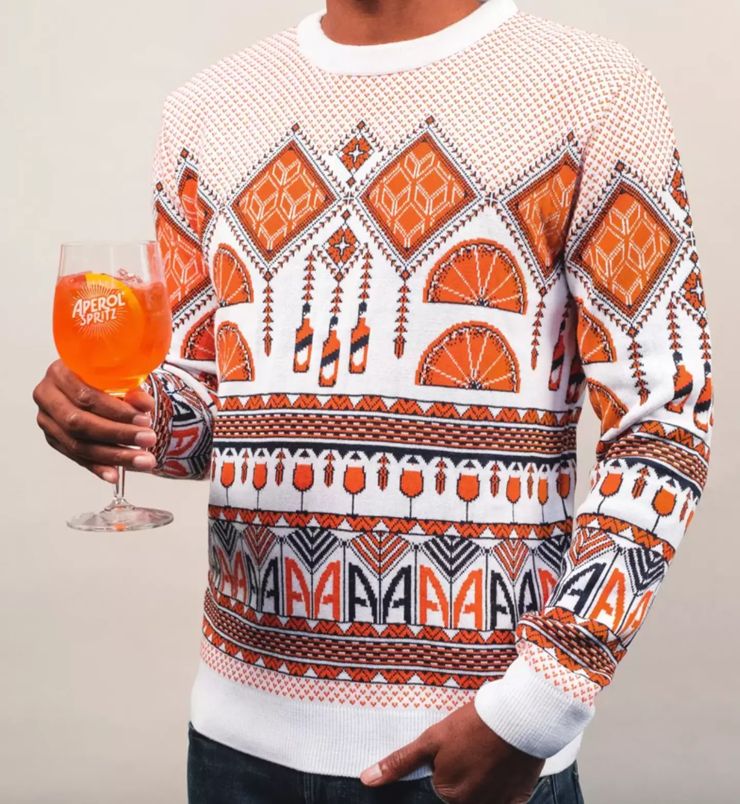 The unisex jumper goes best with an aperol spritz in hand (