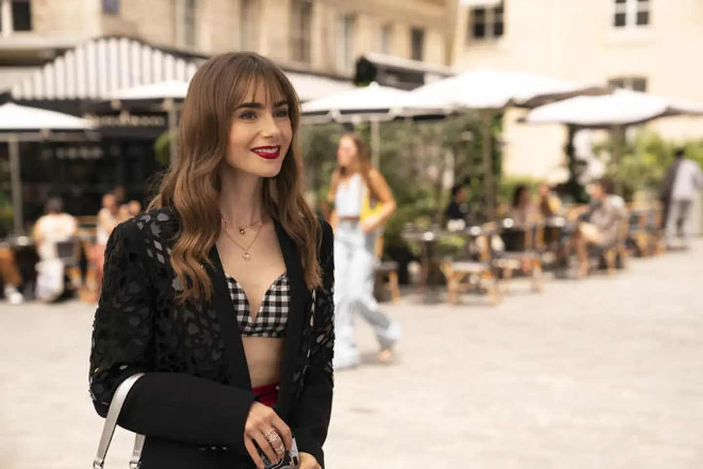 Lily Collins as Emily.