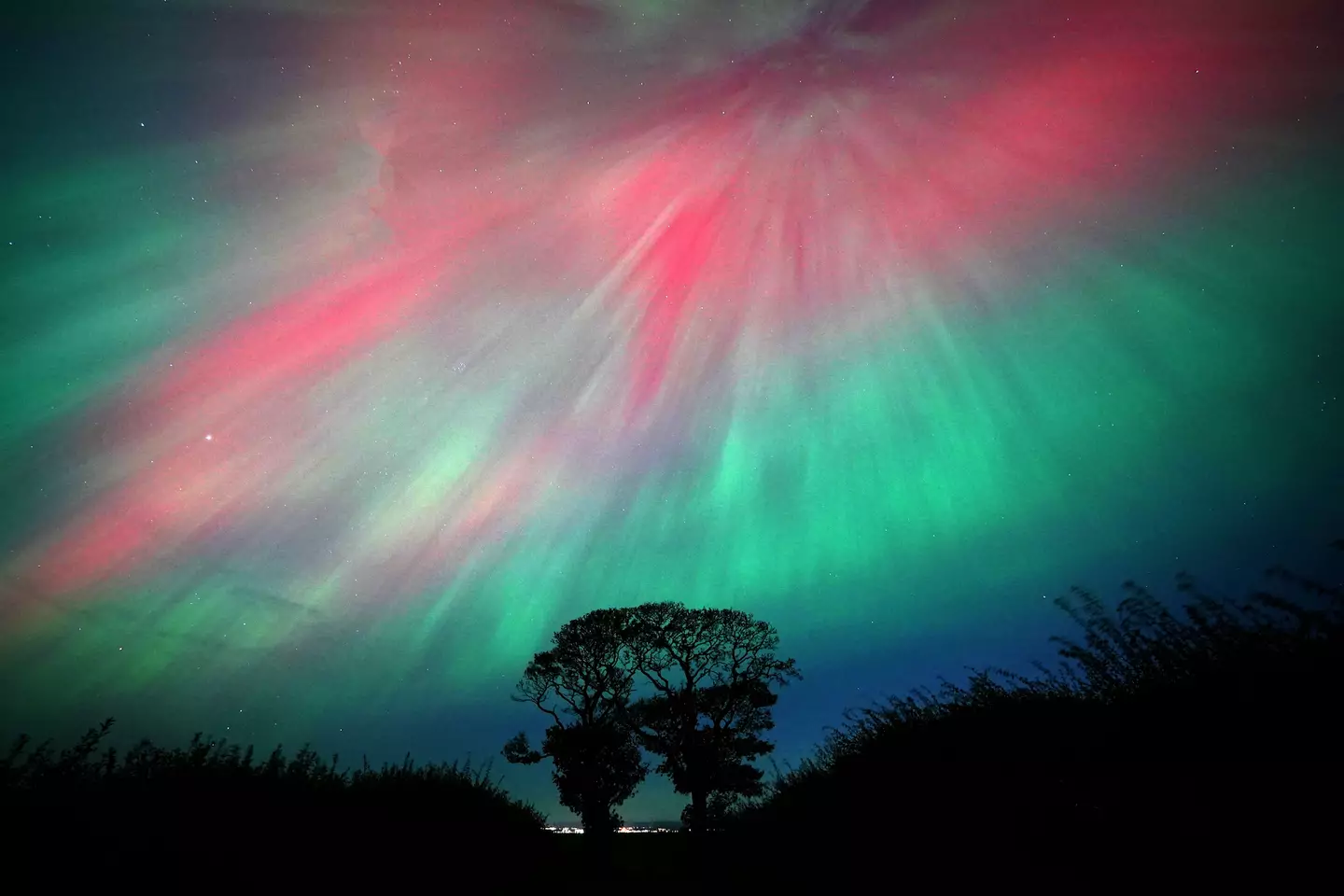 The Northern Lights will be visible in parts of the UK again tonight (PA)