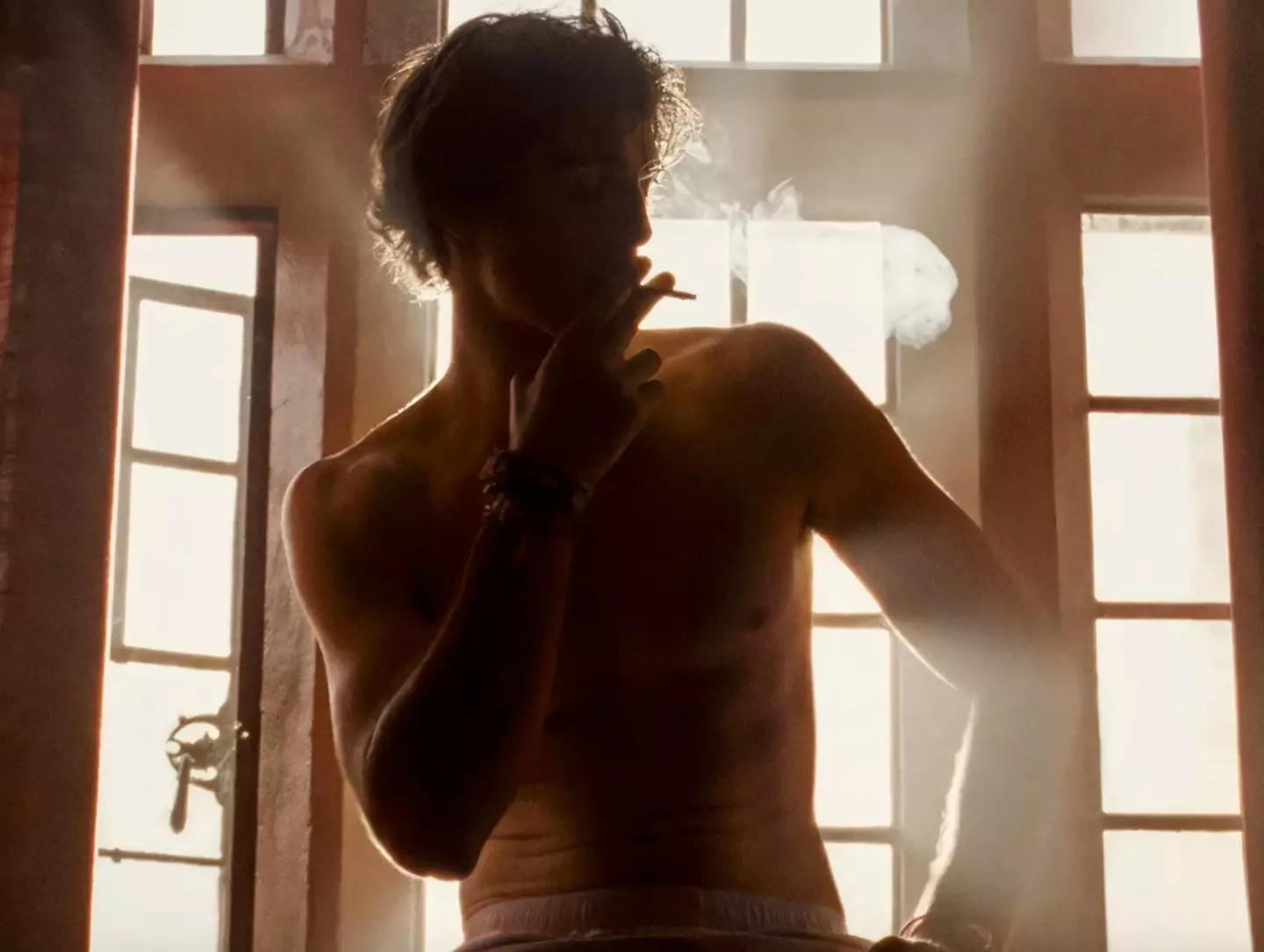 Jacob Elordi as Felix Catton.