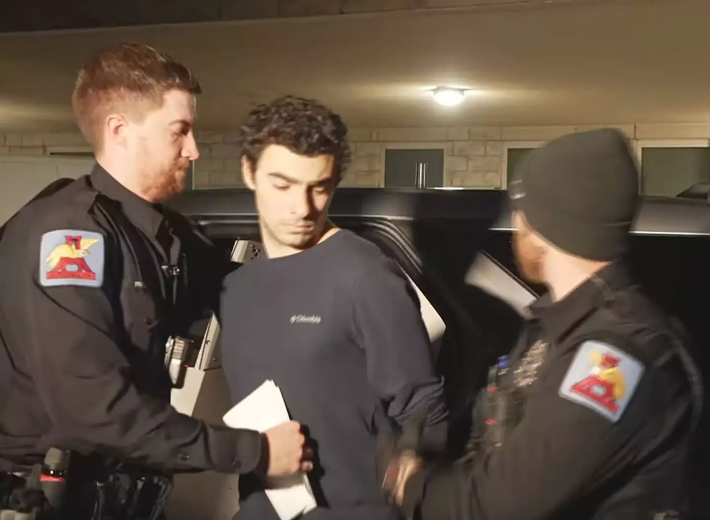 The Ivy League graduate was taken into custody on Monday (9 December) (NBC News)