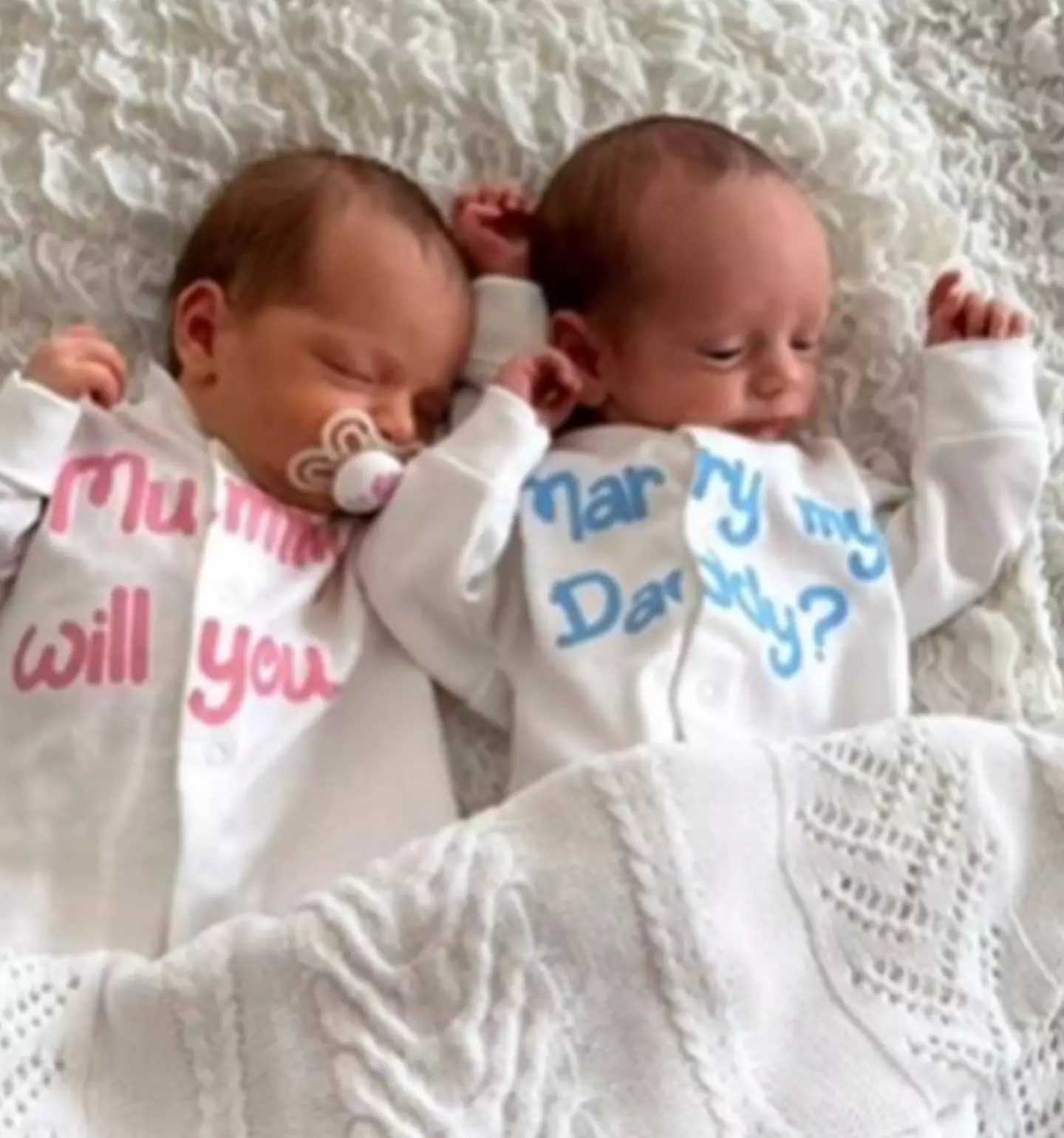 The adorable new twins were in the video.