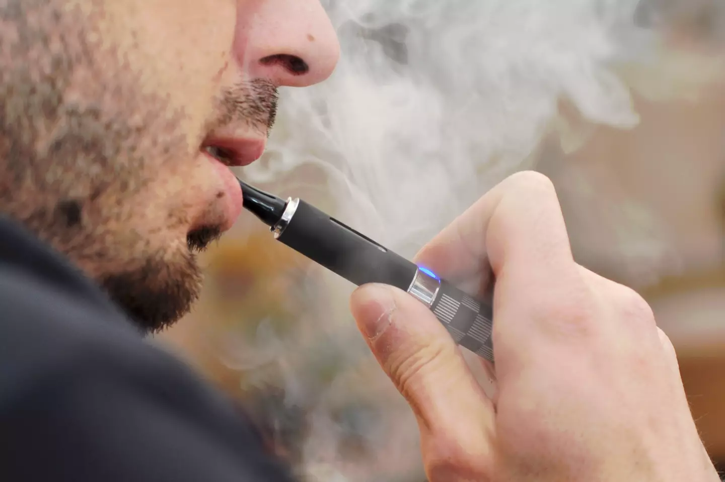 An expert has explained the worrying 'nic-sick' side effect of smoking and vaping (Getty Stock Images)