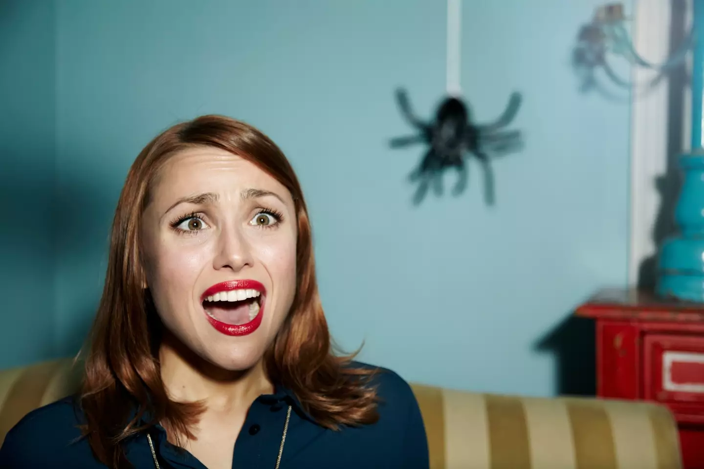 "Oh no, a giant spider! Good thing I remembered to put my lipstick on for this scream."