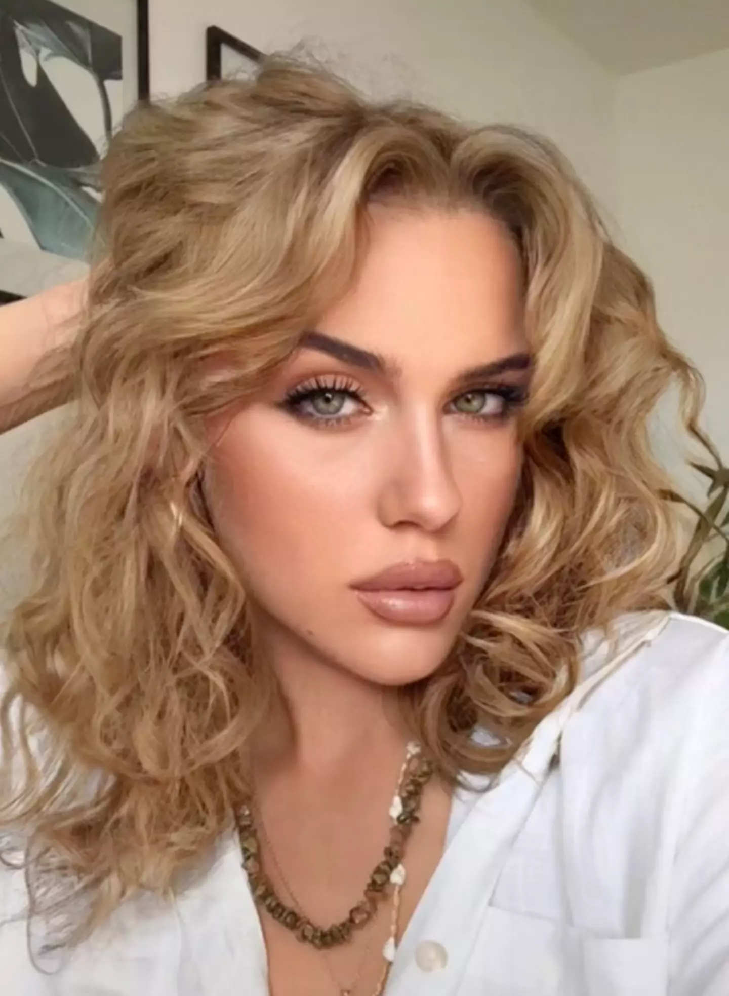 Katharina was able to totally change her look using a face editing app.