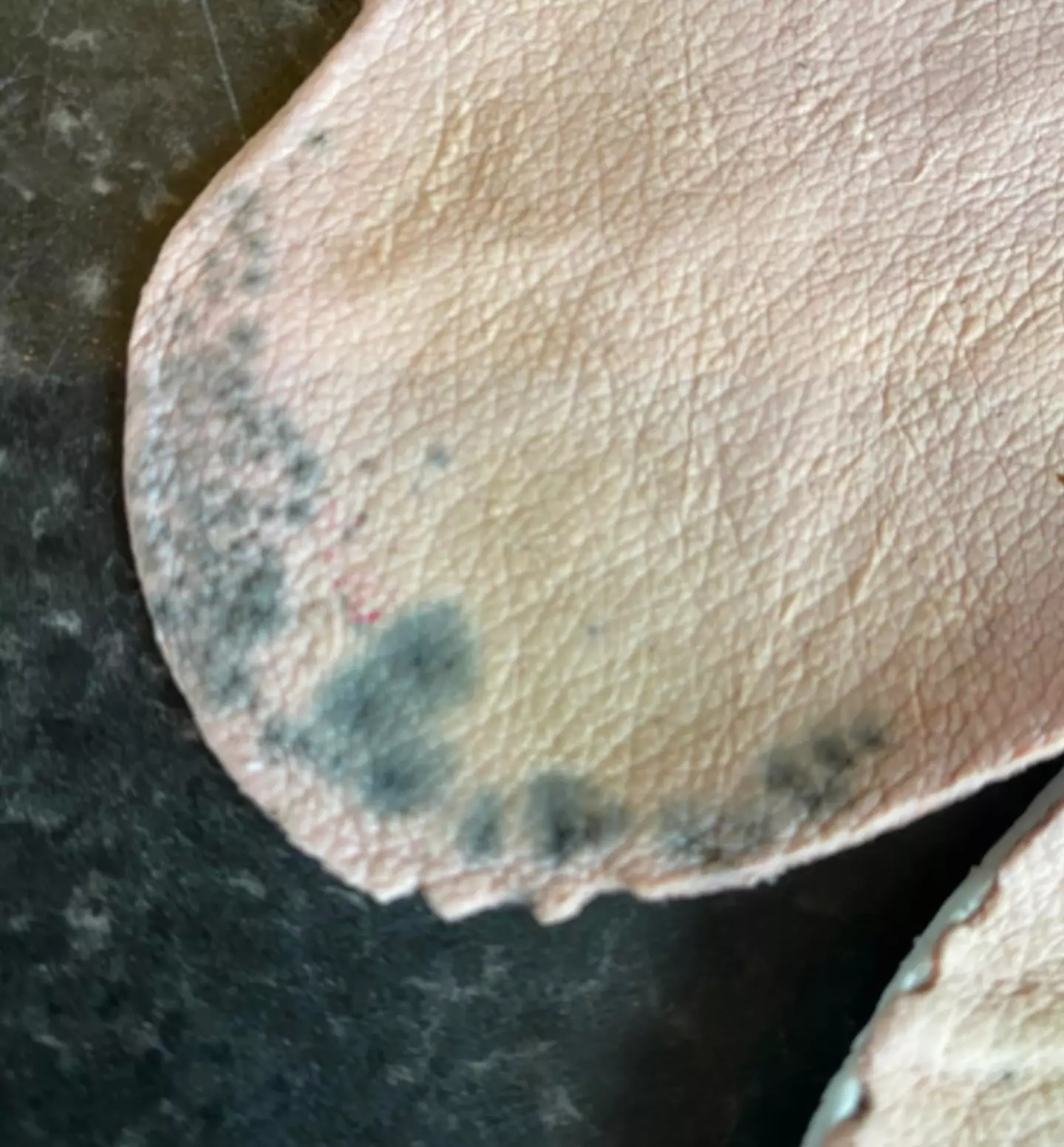 The mum claimed the shoes, less than a month old, had grown 'mould spores'.
