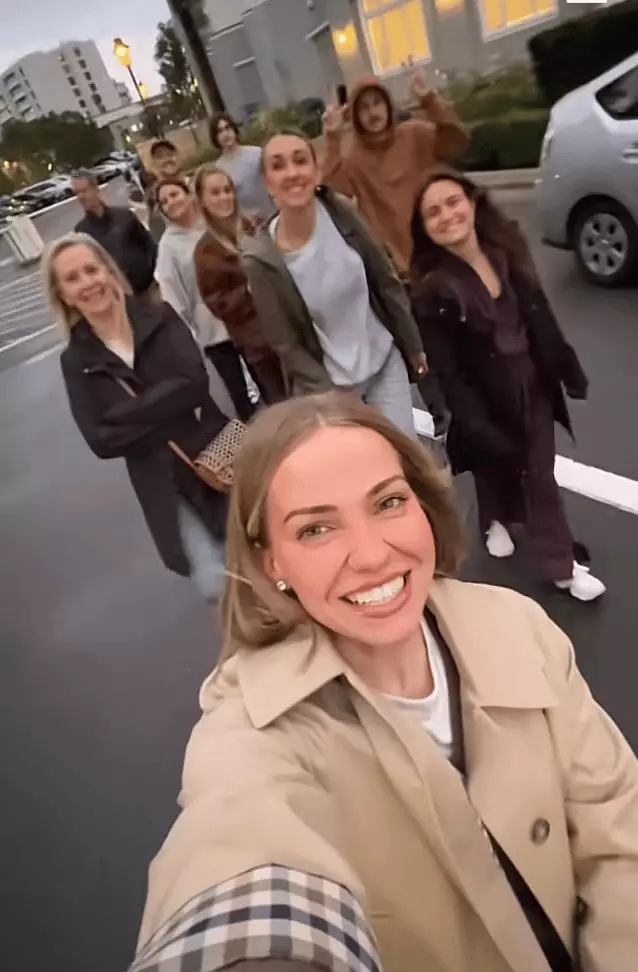 Brady featured in the background of Kiser's Christmas video (TikTok/@emiliekiser)