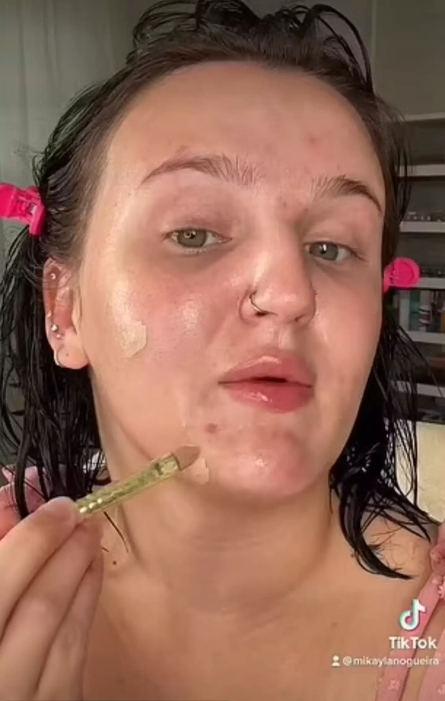 Mikayla recommends using a brush to apply concealer.
