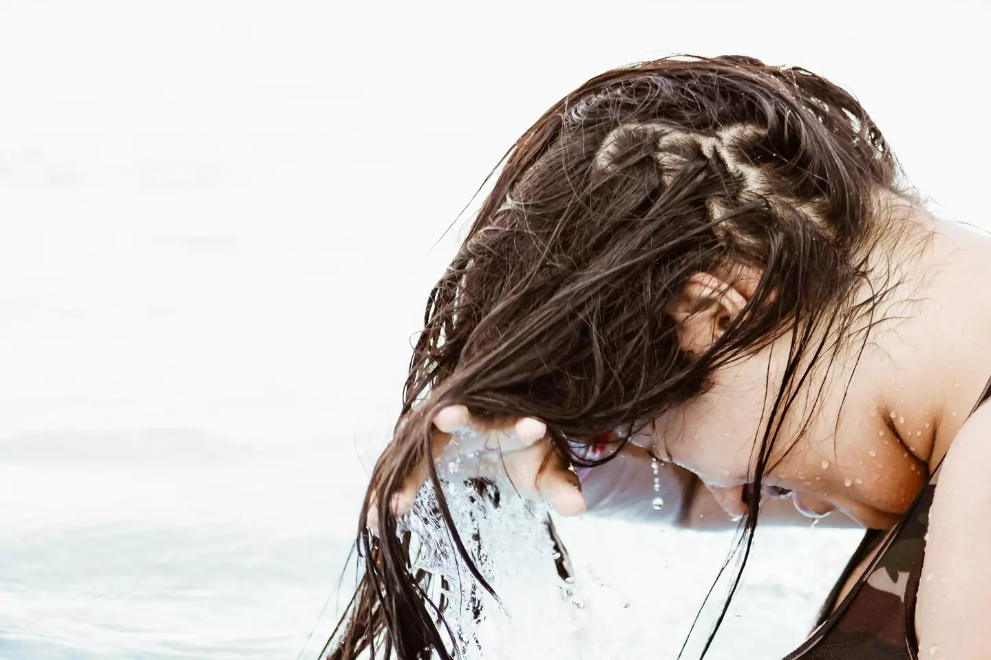 Shampoo can strip your hair of it's natural moisture, according to experts. [