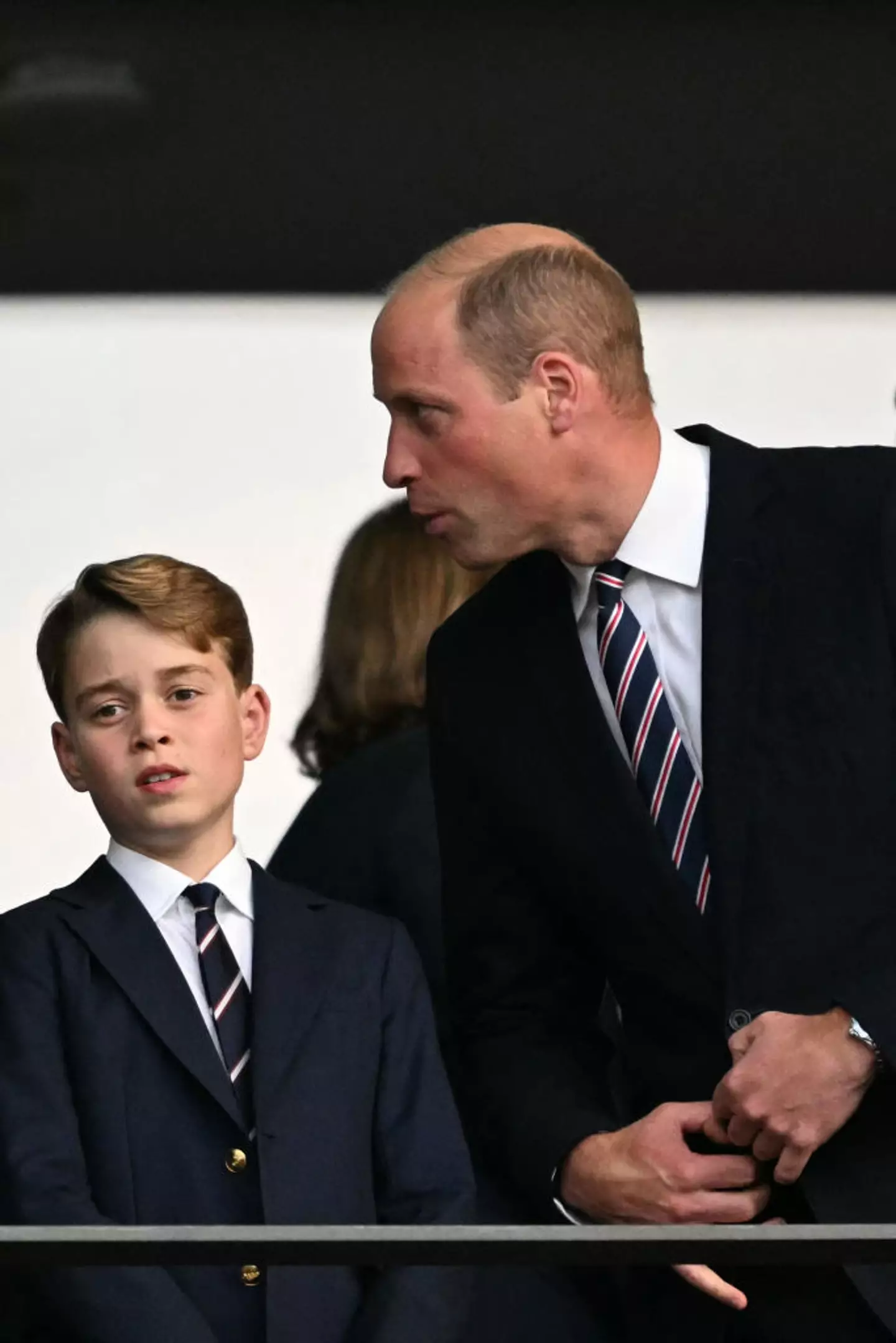 The dad and son duo, shown here at the Euros final, wore matching suits. (INA FASSBENDER/AFP via Getty Images)
