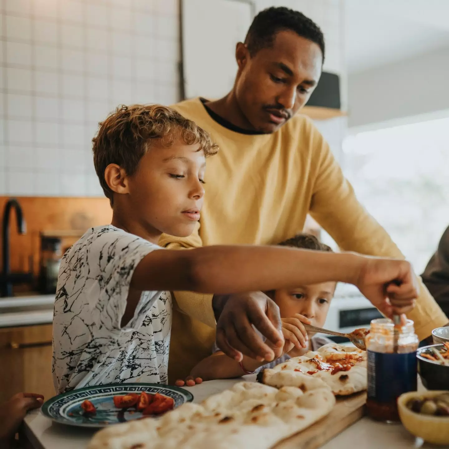 A 'dibling' is an informal phrase that can be used to describe your child's biological connections (Getty Stock Image)