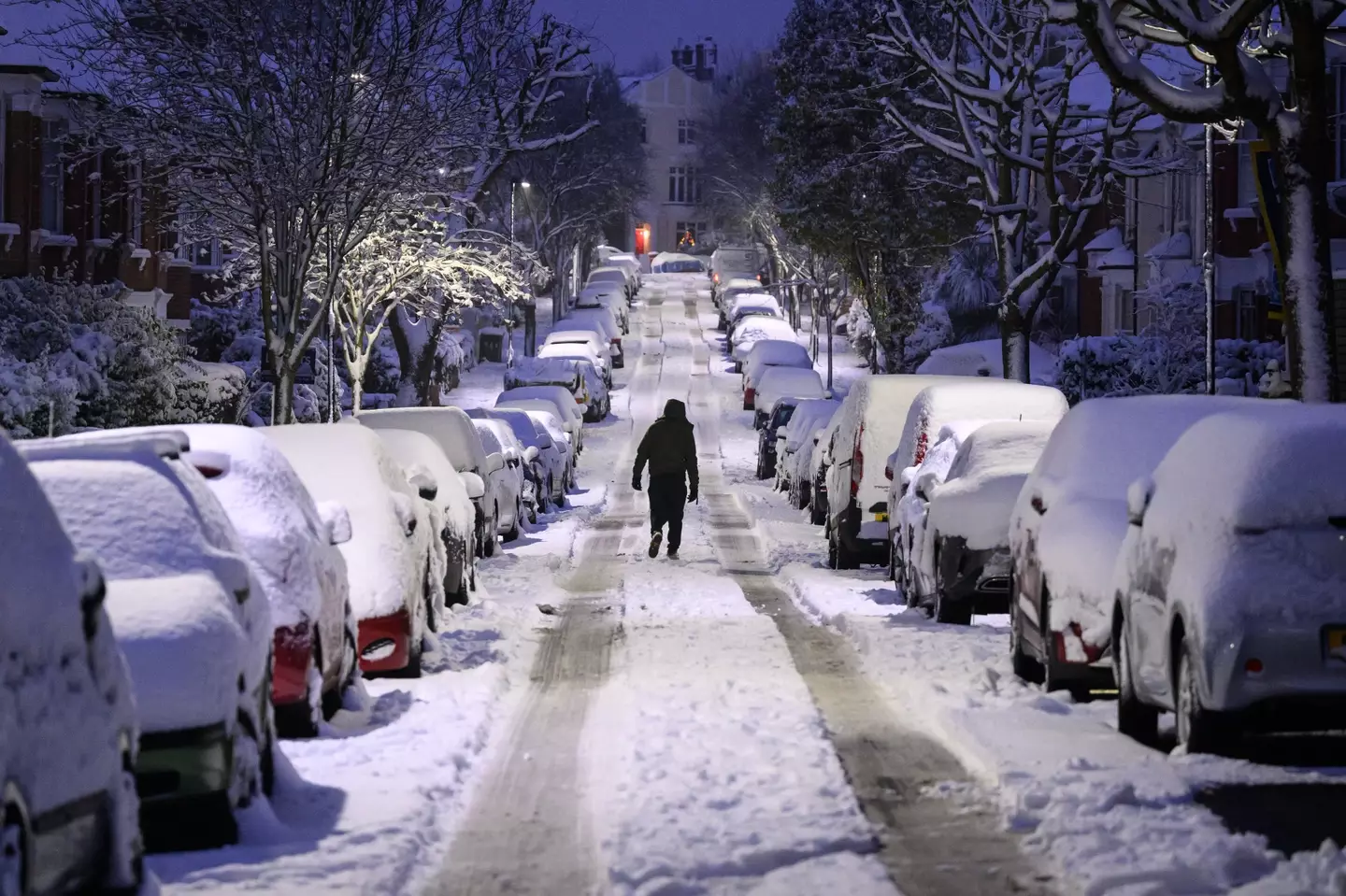 Icy patches can make driving conditions dangerous and increase the likelihood of injuries from falls on slippery surfaces (Leon Neal/Getty Images)