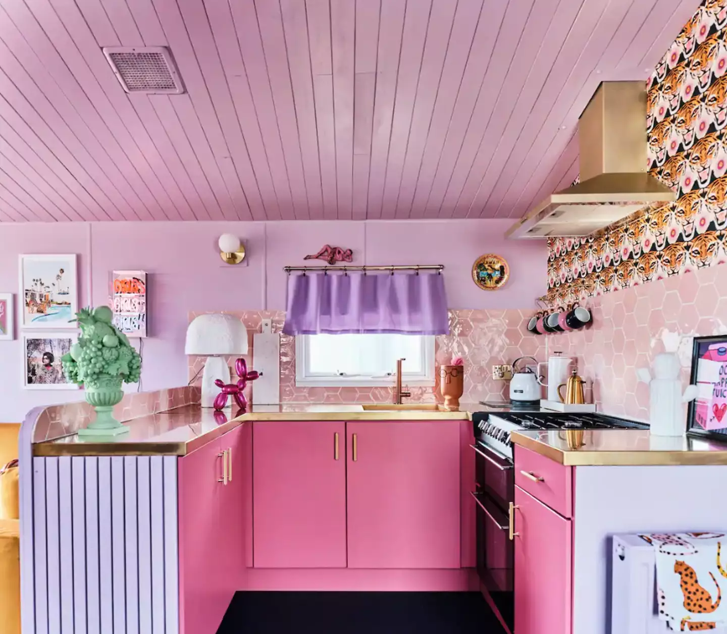 Live out your Barbie fantasies in this pink kitchen.