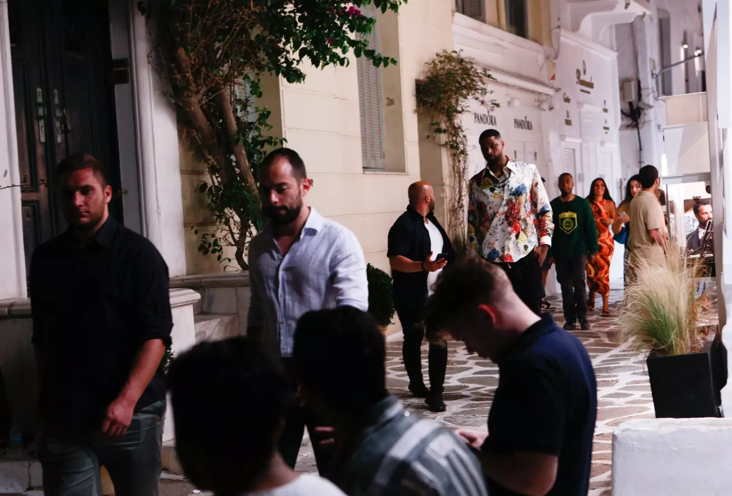 Tristan Thompson has been spotted partying in Greece ahead of the birth of his baby with Khloé Kardashian.