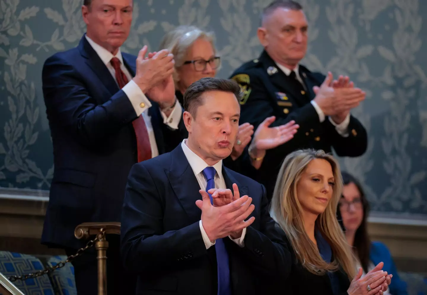 The woman has since been revealed to be aesthetician Heather Valentino (Chip Somodevilla/Getty Images)