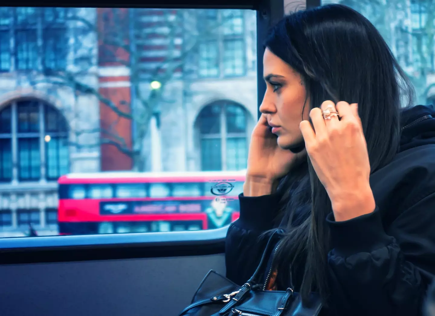 The woman was on the bus when she called (