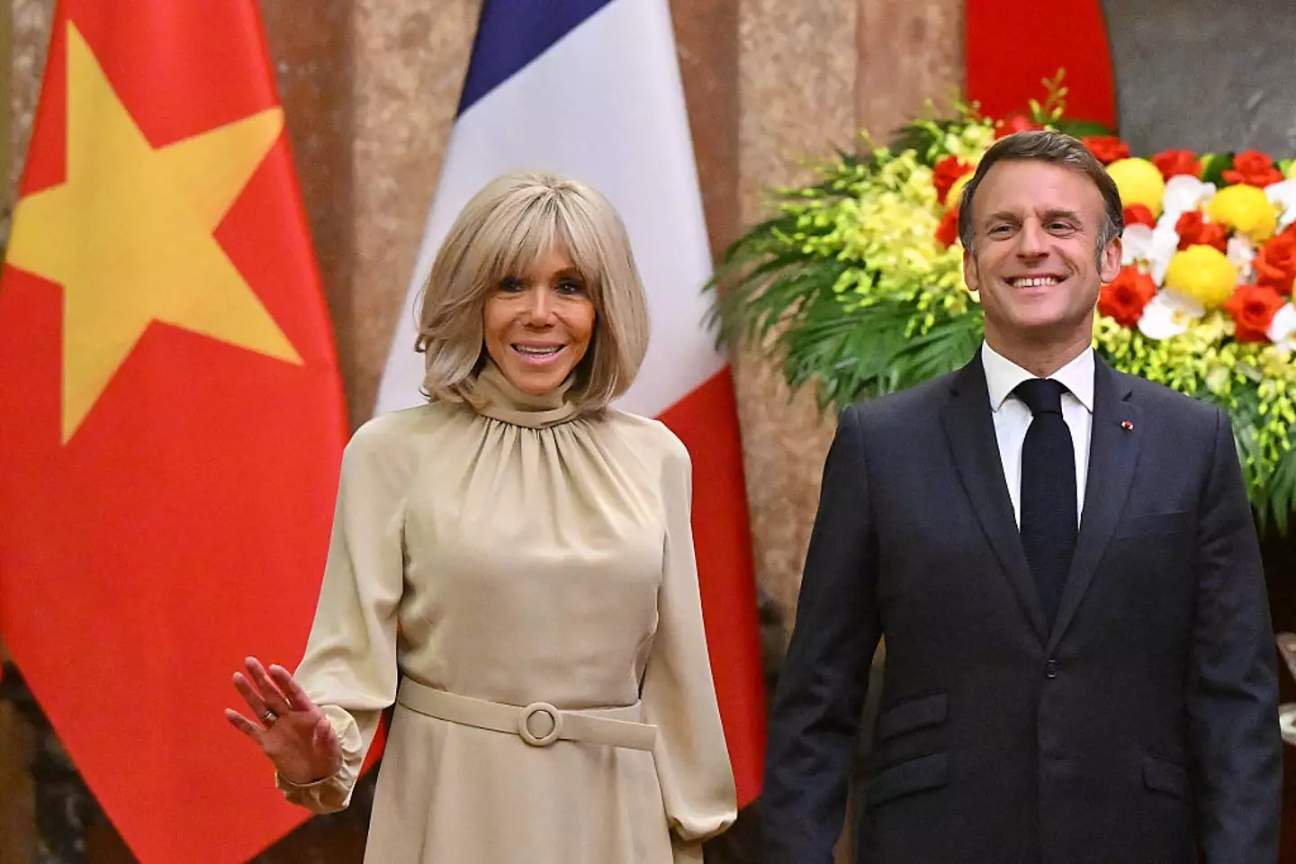 The now-viral moment took place when the couple landed in Hanoi, Vietnam, to begin their tour of South-East Asia (NHAC NGUYEN / Contributor / Getty Images)