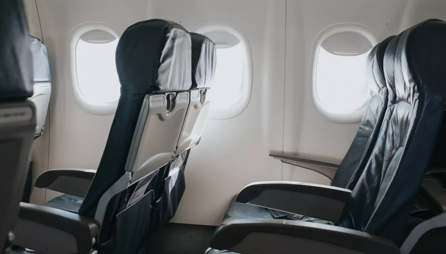 The couple even got the flight attendants involved. (Catherine Falls Commercial / Getty Images)