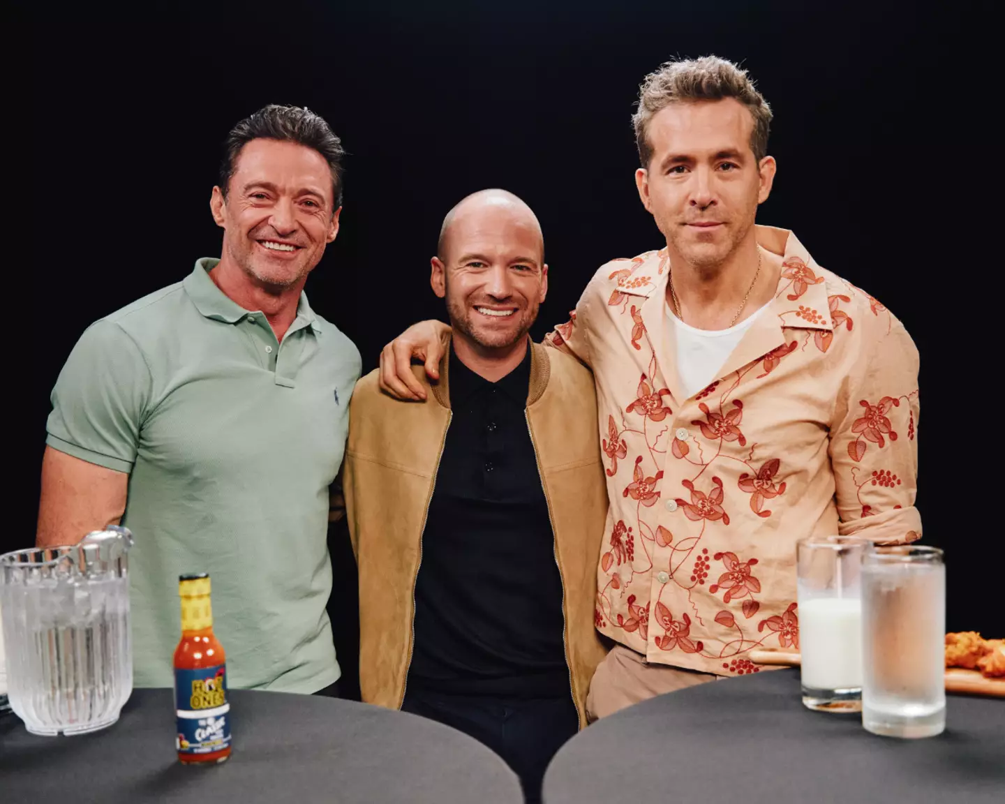 Evans with Deadpool stars Hugh Jackman and Ryan Reynolds (Instagram/@seanseaevans)