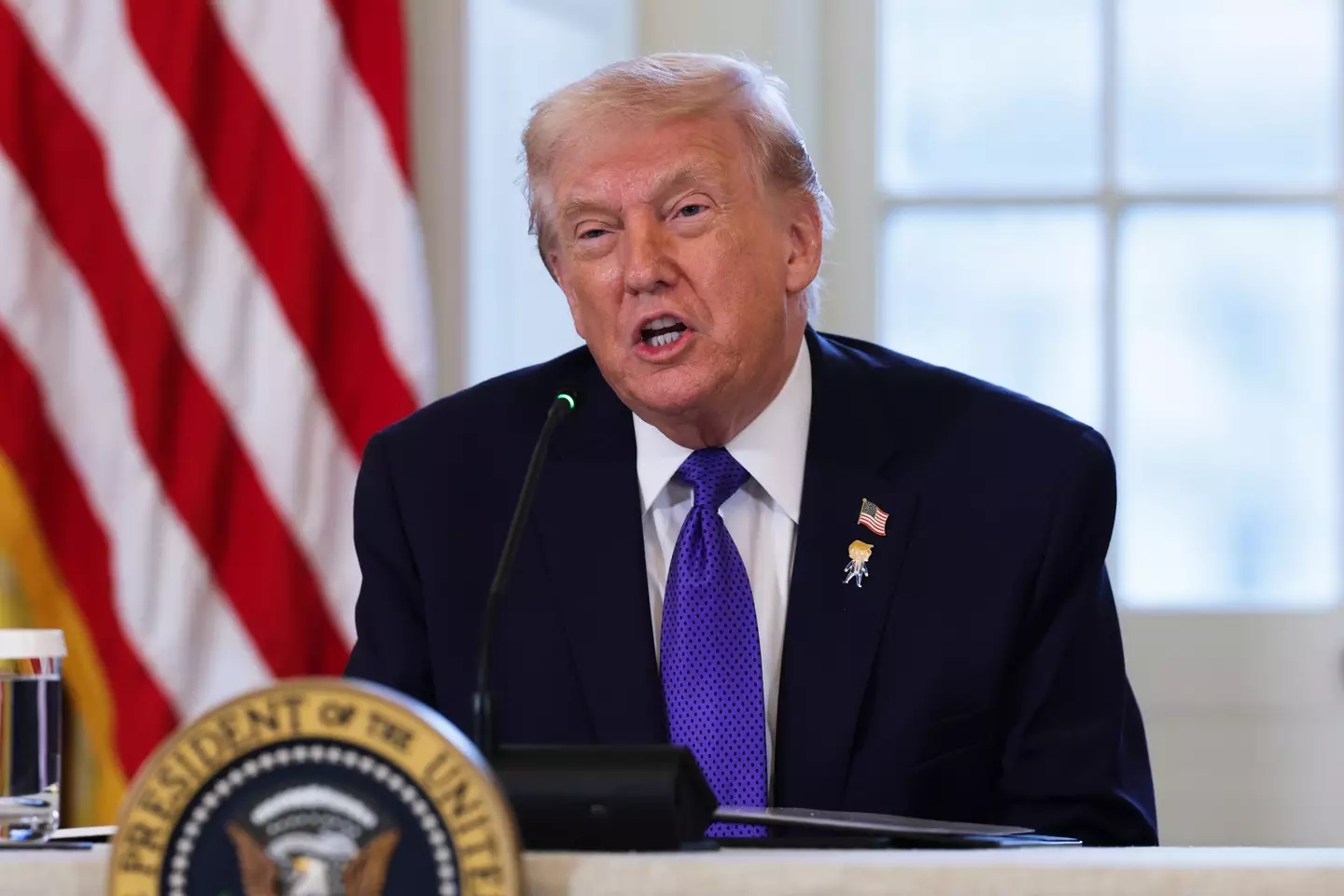 An initial 12 countries were banned by Trump (Alex Wong/Getty Images)