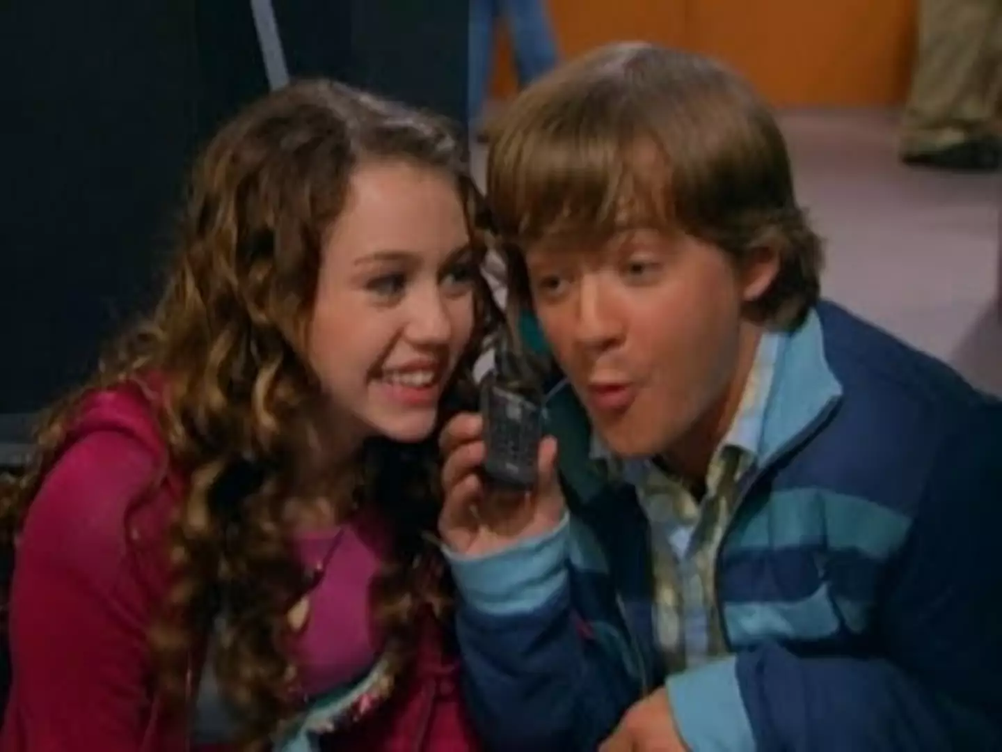 Miley Cyrus and her on-screen brother, Jason Earles, in Hannah Montana (Disney)