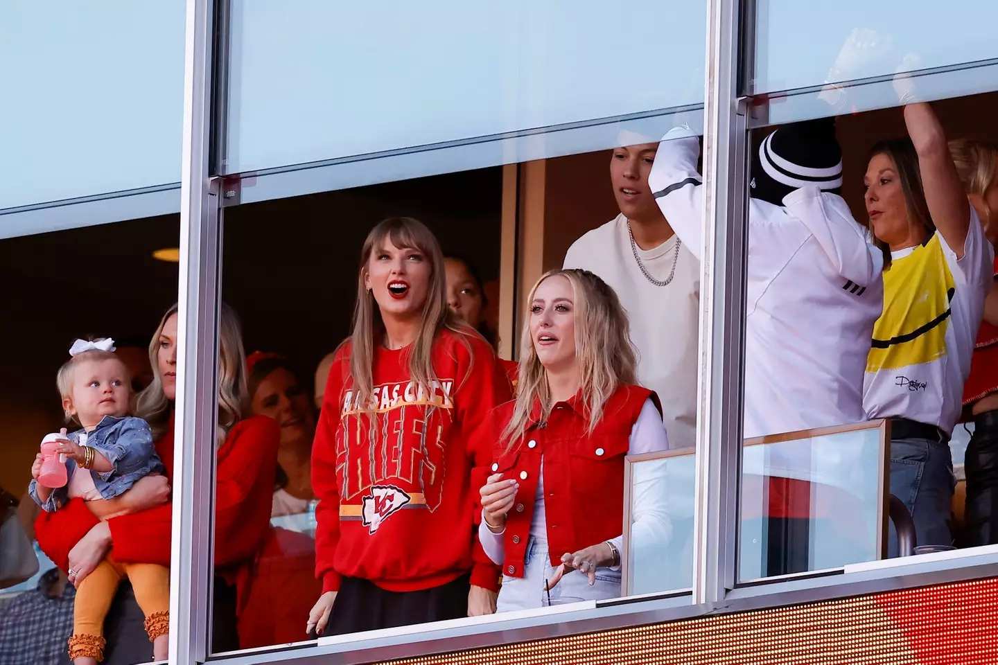 Taylor supporting Travis at last night's NFL game.