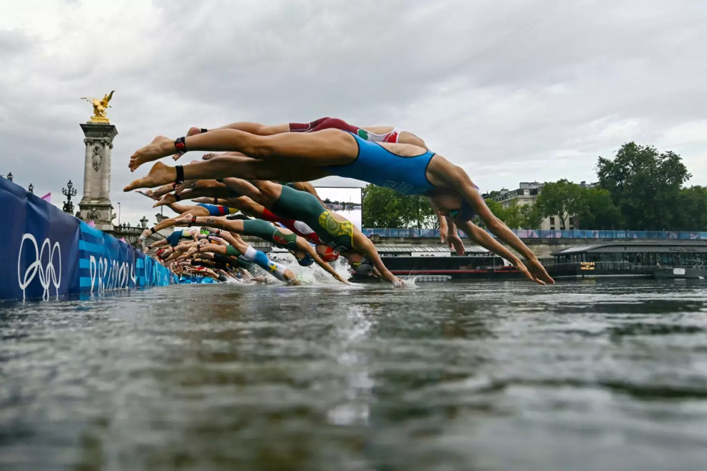 Olympic swimmers competing in the Seine. (Martin Bureau - Pool/Getty Images)