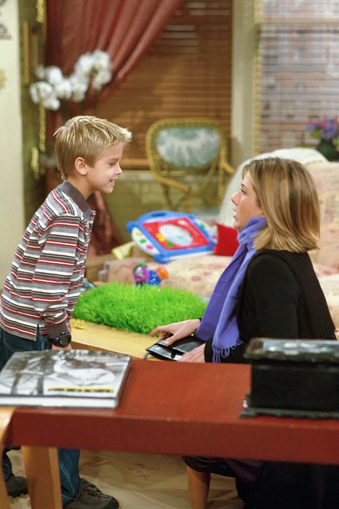Cole Sprouse was just a kid when he worked on Friends with Jennifer Aniston (NBCU Photo Bank/NBCUniversal via Getty Images via Getty Images)