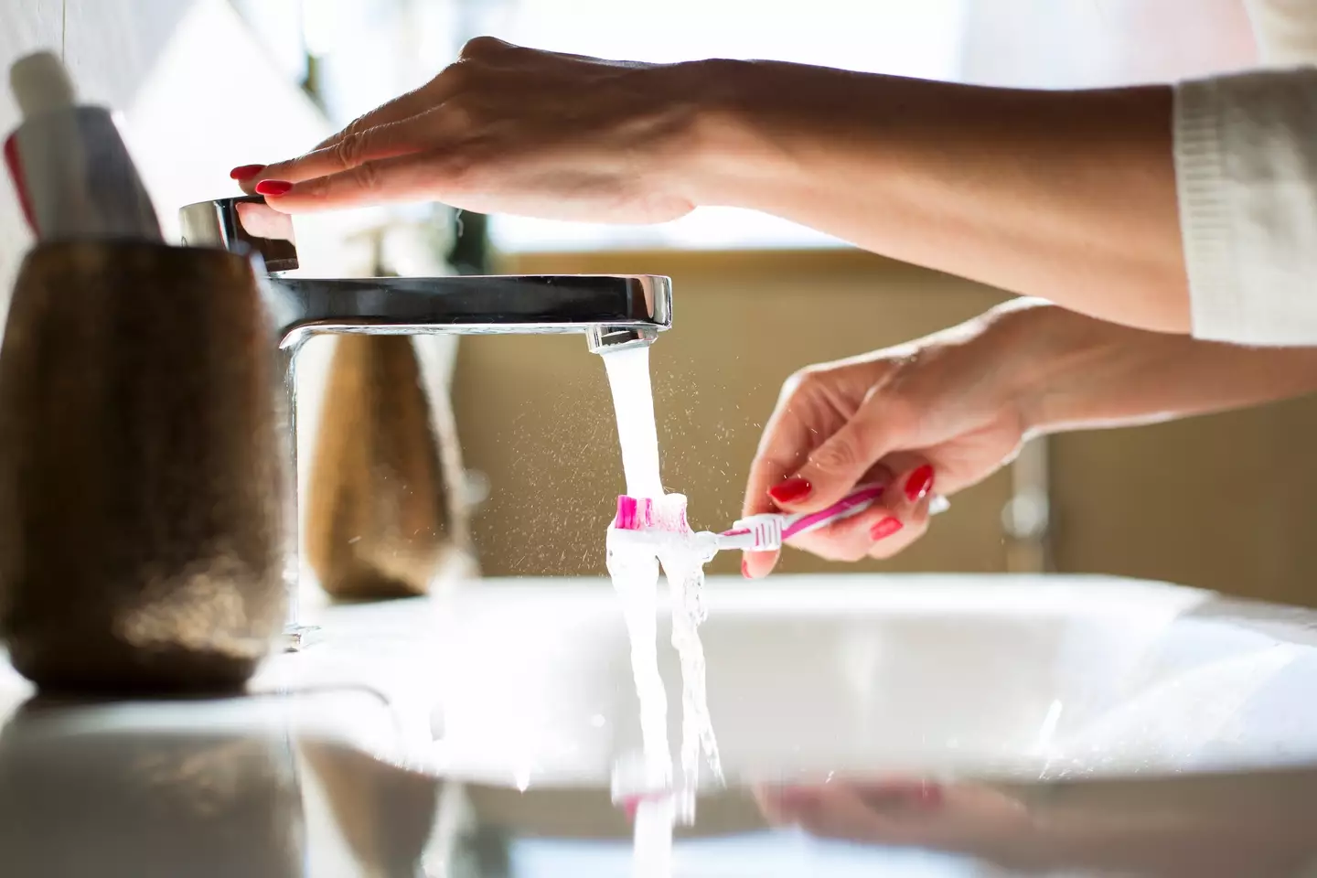 It's important to brush your teeth at least twice a day to avoid plaque buildup (Kathrin Ziegler / Getty Images)