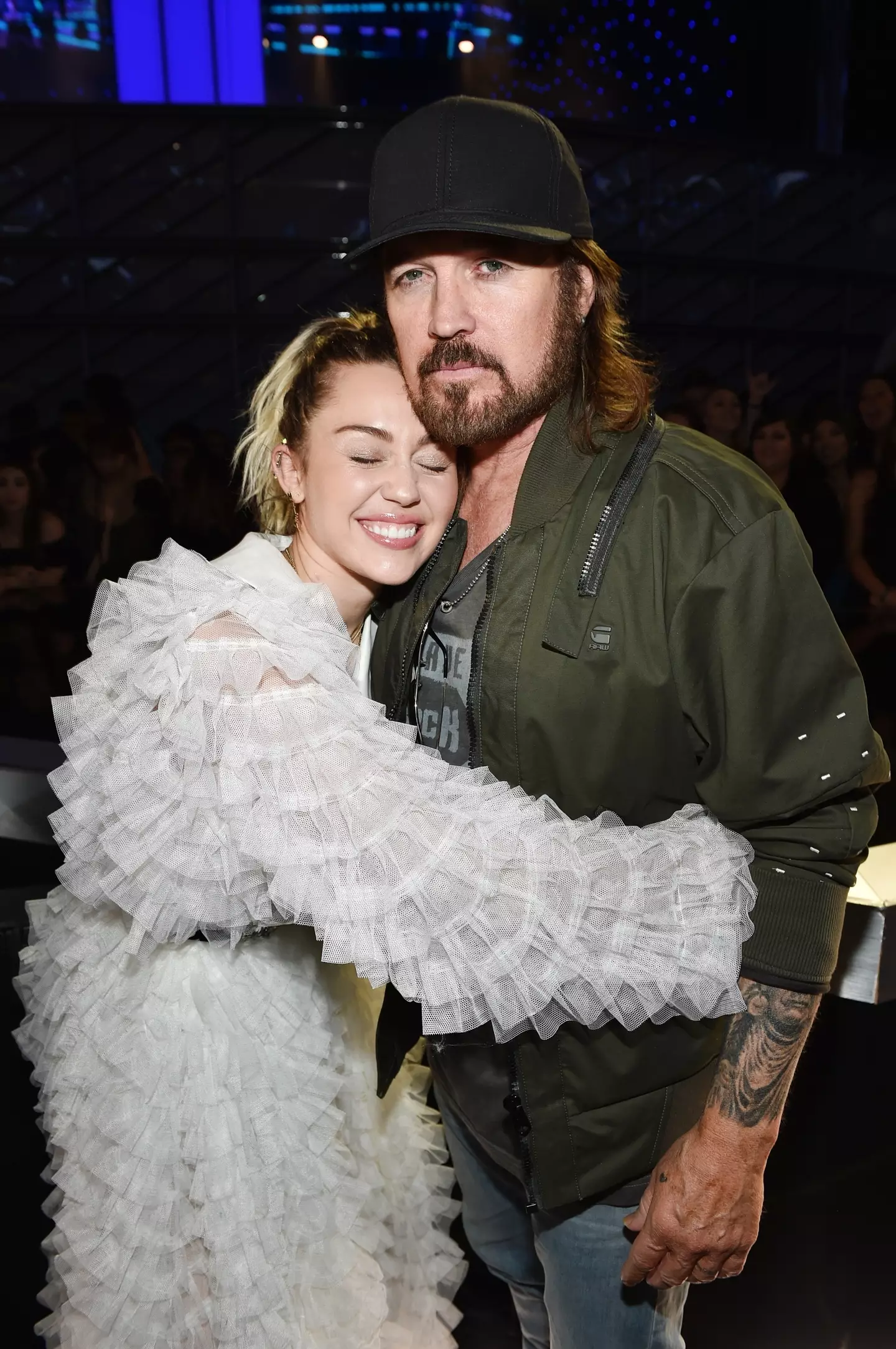 Miley and her father are rumoured not to be on speaking terms.