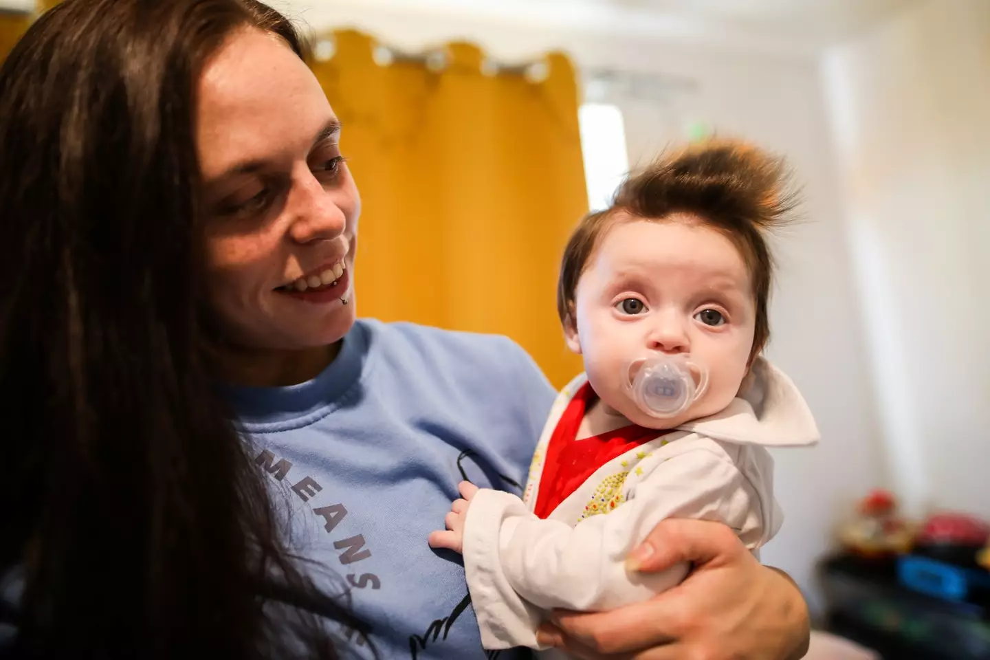 Strangers can't believe how much hair Hallie has.