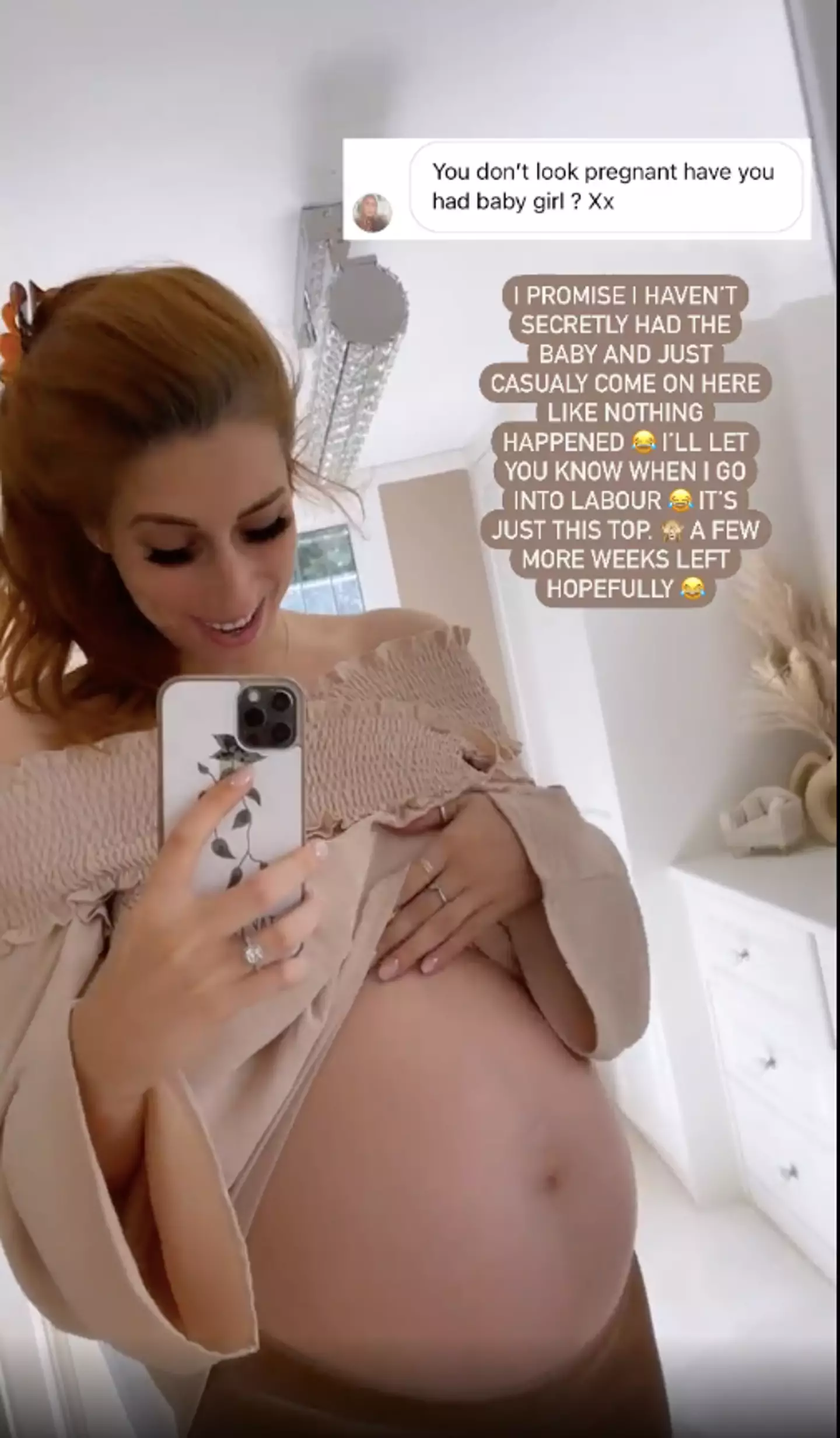 Stacey showed off her bump, explaining it was just her top (