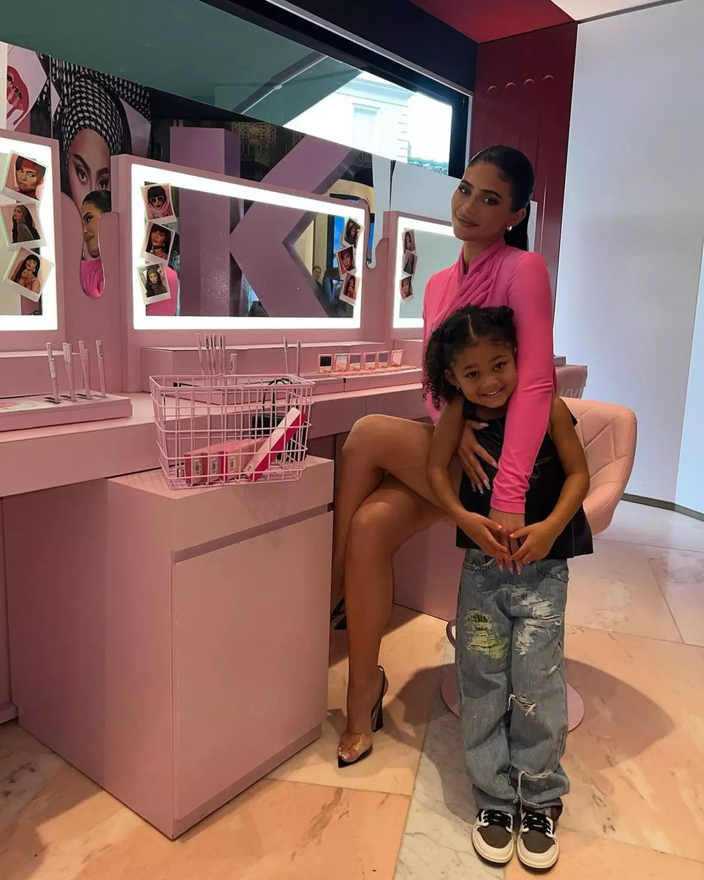 Kylie Jenner posing with her daughter, Stormi.